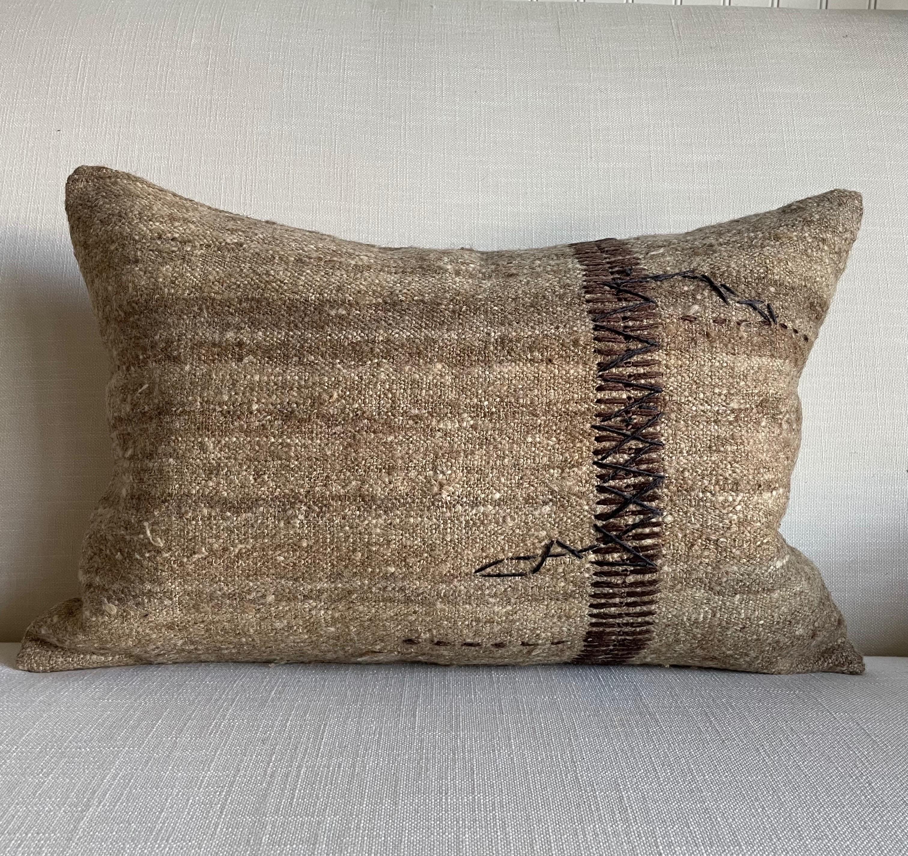 Zia Lumbar Pillow
Beautiful neutral warm brown tones, woven with a thick soft nubby texture.
Size: 16” x 24”
Backing: Linen with hidden zipper closure.
Down/Feather Insert included.