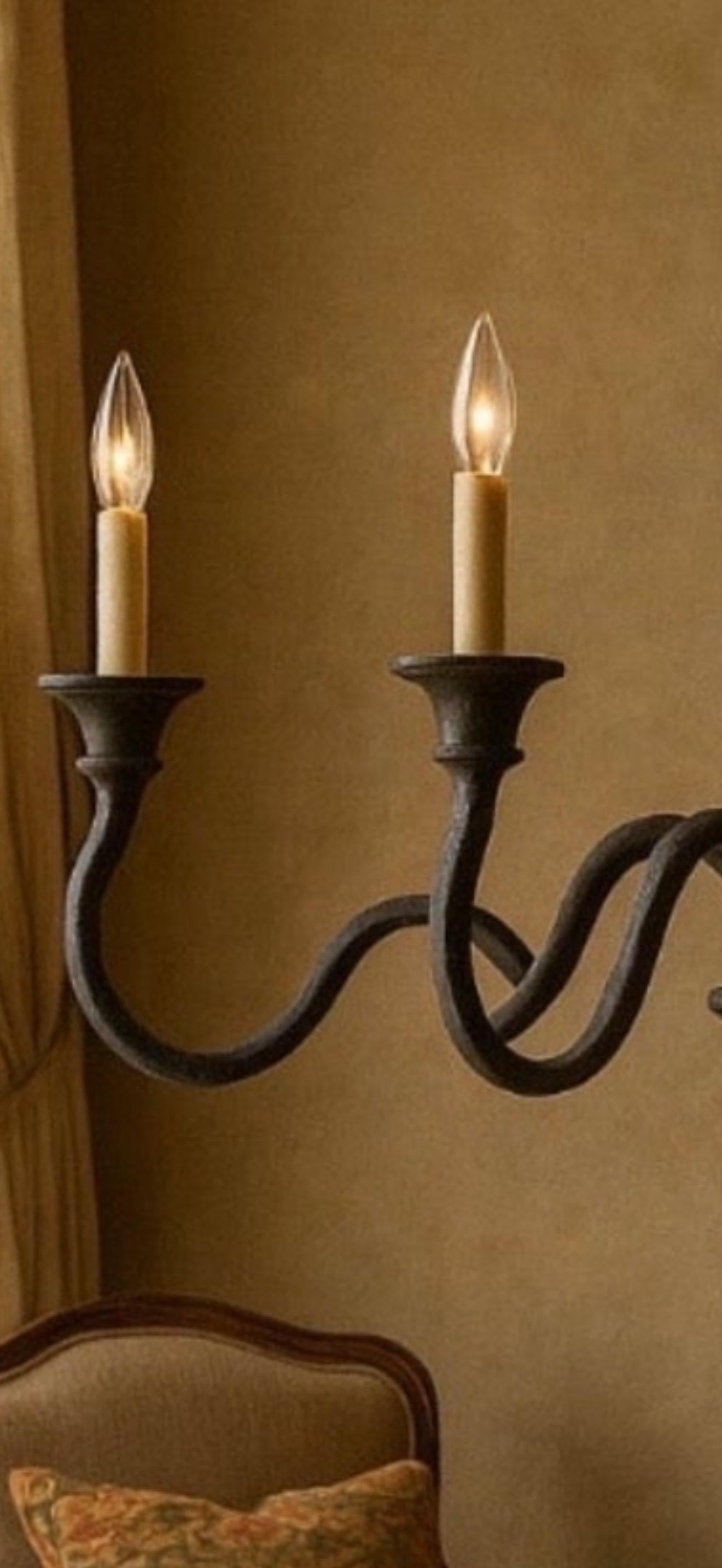 A timeless and sculptural six-light chandelier designed by Melissa Levinson for Miamar Home, handcrafted in Los Angeles.  

This chandelier features gracefully scrolled arms radiating from a central baluster form, with a dintinctive twisted figure