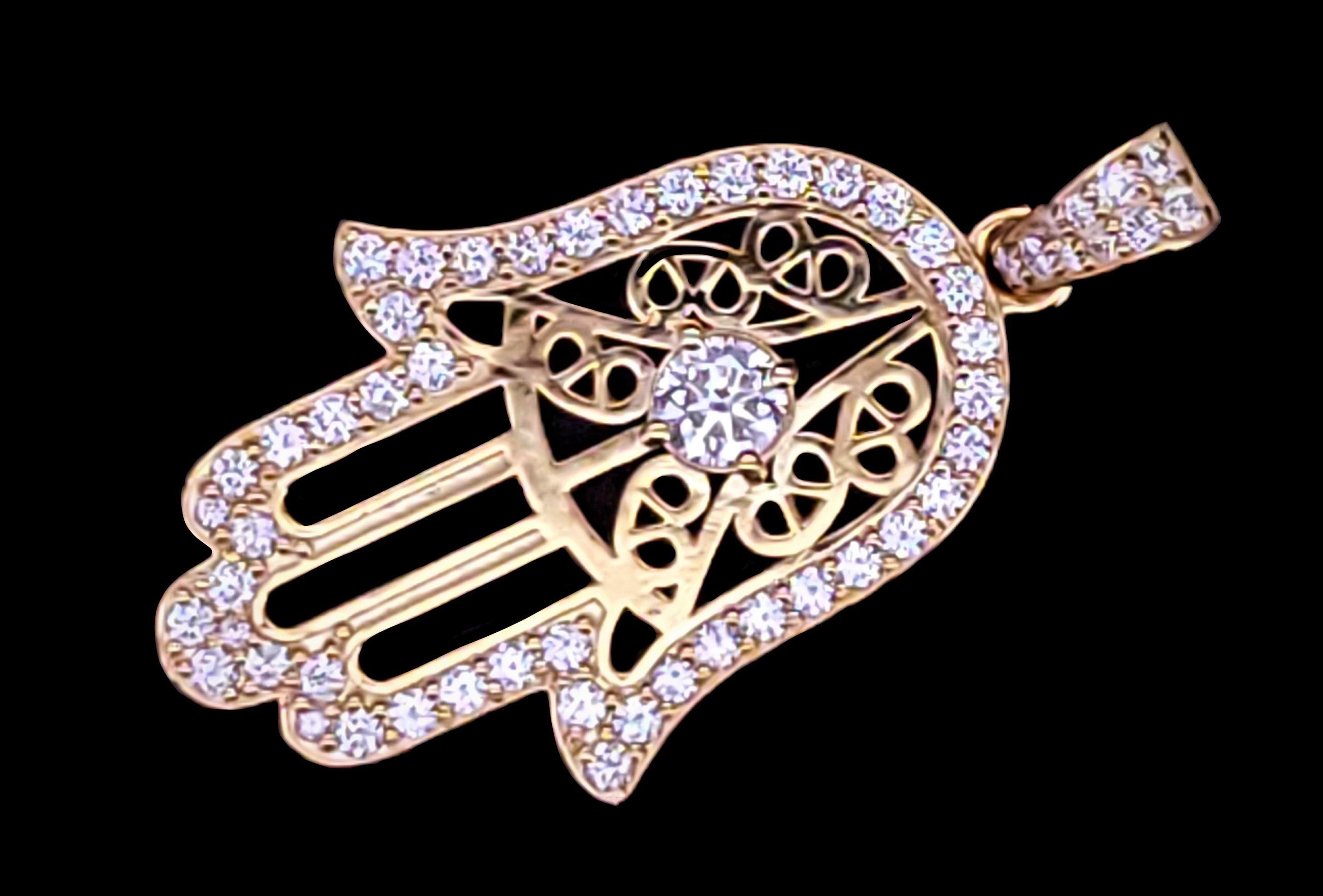 Pendentif Hamza fabriqué sur mesure
MATERIAL Or jaune 14K

Dimension du pendentif :
Longueur : 31,5 mm
Avec la caille : 41.7mm
Largeur : 22,4 mm
Épaisseur : 2,6 mm

Dimension de la caution :
Longueur : 8,6 mm
Largeur : 4.5 mm
Épaisseur : 1 mm

Les