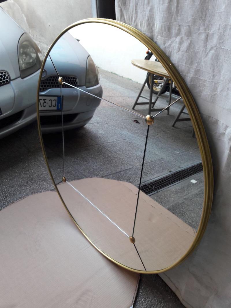 Pescetta presents its collection of contemporary customizable mirrors.

With brass frame, window pane look and brass studs these mirrors replicate the idea of early 20th century Art Deco style mirrors.
They suit both modern spaces which need a
