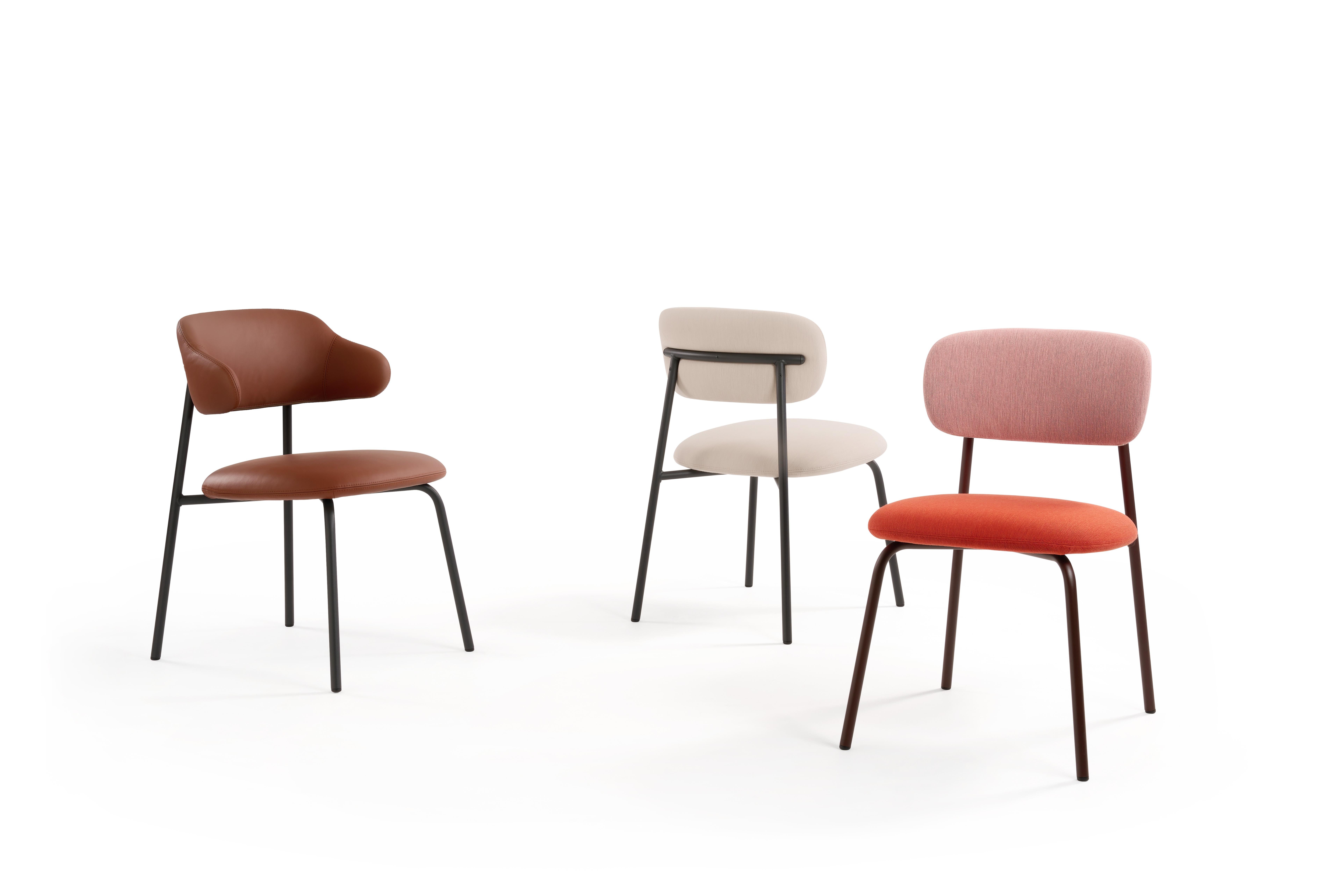 Lightness redefined. Aloa is a simple and elegant family of chairs and bar stools with an upholstered seat and back, supported by a graphic metal frame. Highly comfortable, Aloa fits perfectly around a dining table, at a restaurant or a meeting