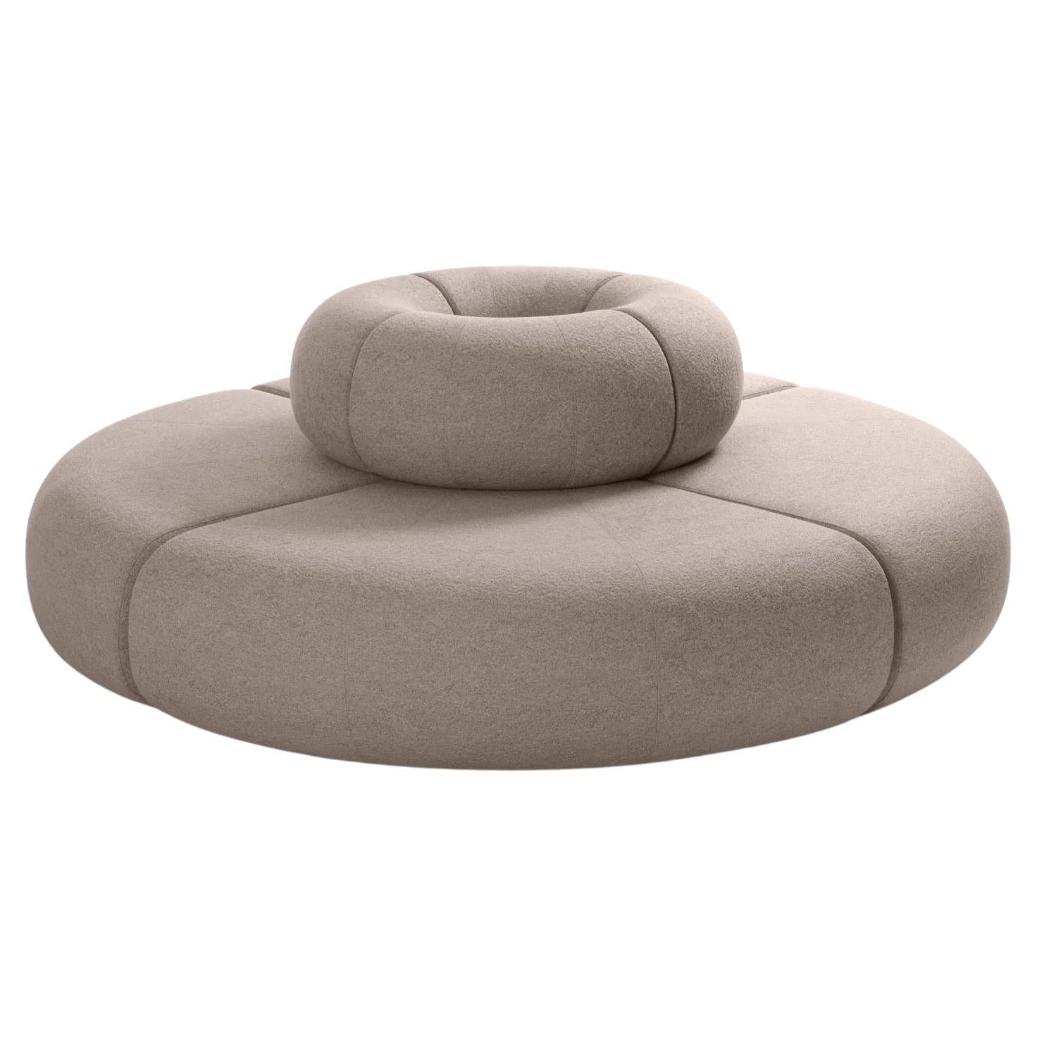 Track is a modular sofa concept with an iconic and sculptural approach. The floating rock-like formations create a comfortable landscape of small seating islands that will become the center of attention in any interior. A solid foam construction to