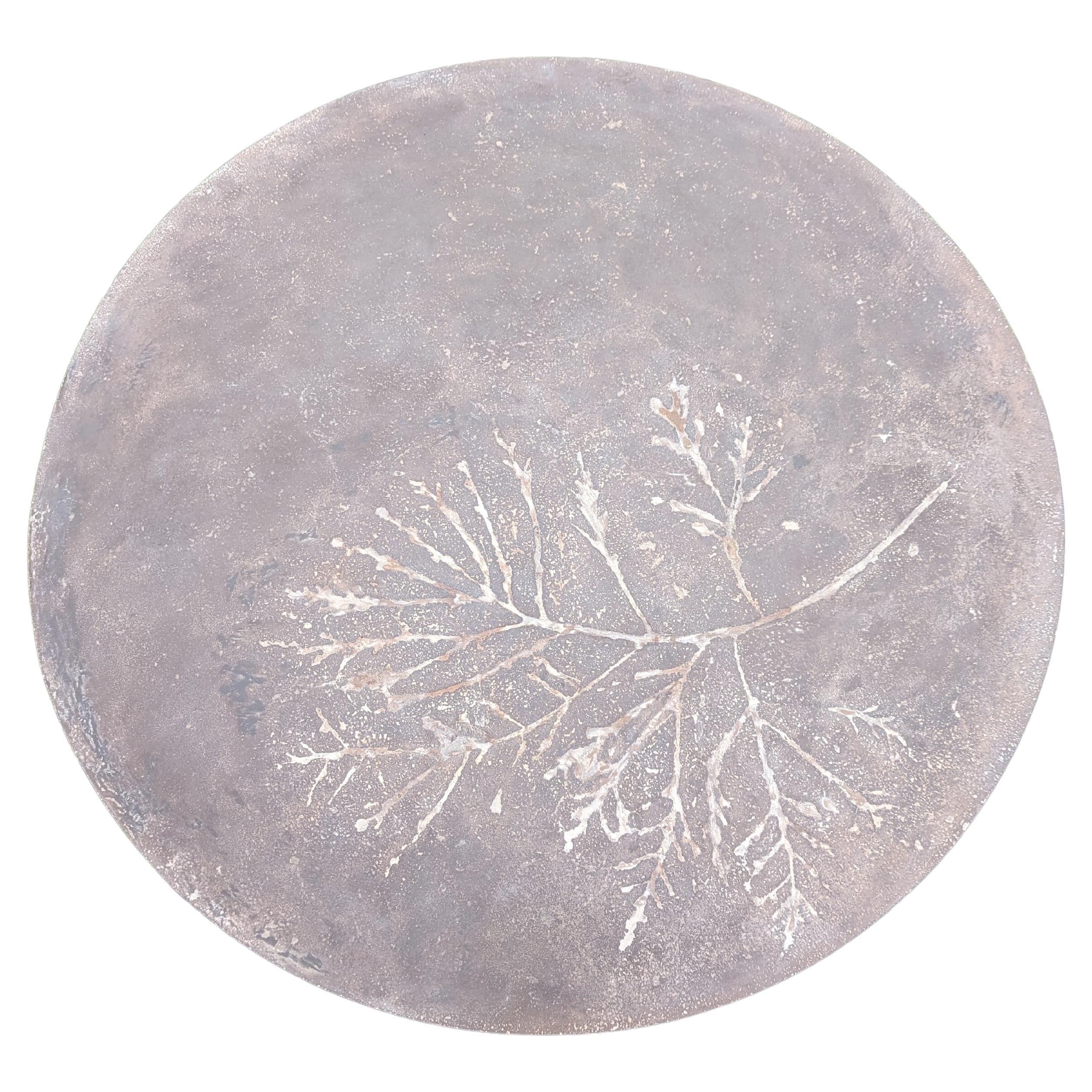 These highly customizable mid-weight round concrete dining or coffee table tops with or without impressions from real leaves can make a natural addition to nearly any room or outdoor environment. Bases are not included, and only provided for
