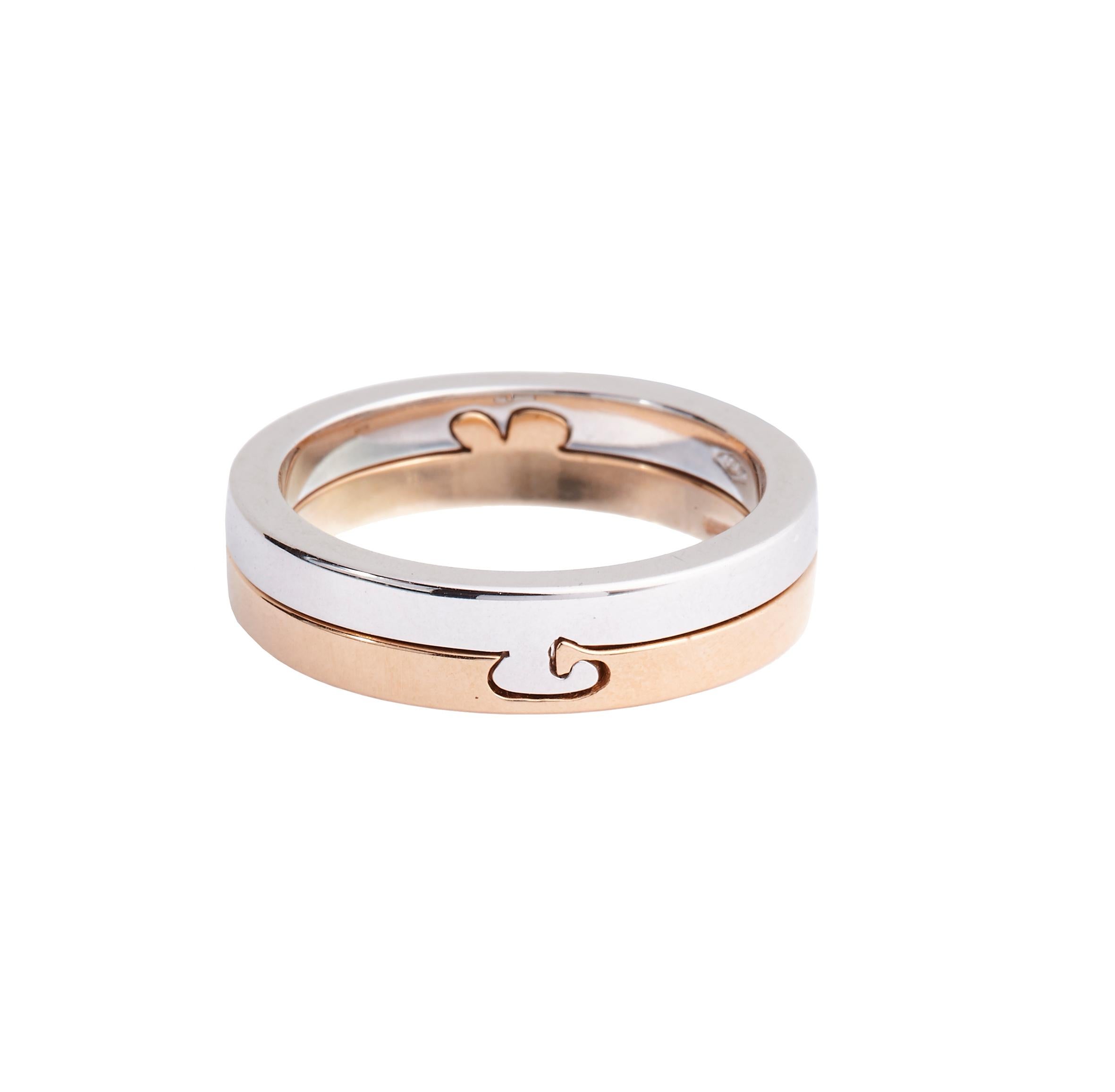 Bespoke 18k Gold Wedding Ring with Interlocking Initials Design
The “Incastro d' Amore” interlocking wedding ring is made of 18 karat white and rose gold. I created it for my husband and I,  since 