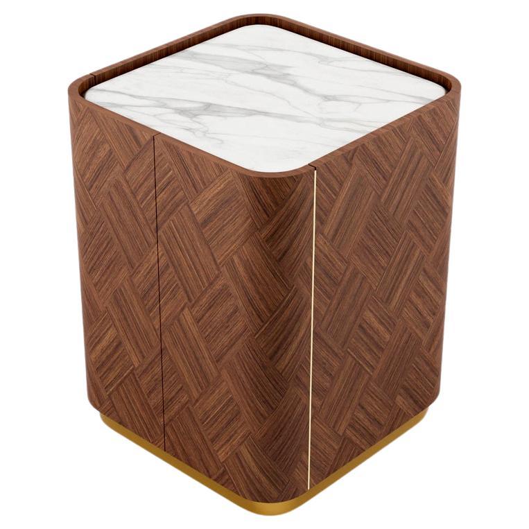 Introducing an exquisite bedside table, a perfect addition to elevate your bedroom decor. With its ample interior space, it offers convenient storage for your dressing essentials. Resting atop a Brushed Brass finish frame, it provides a stylish