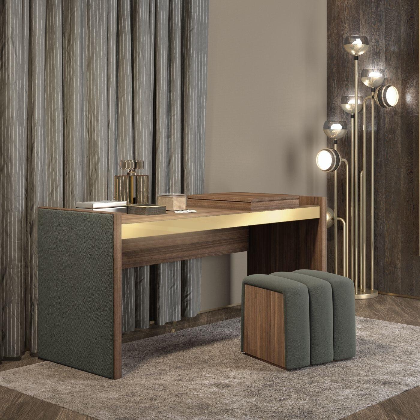 This minimalist desk and accompanying ottoman offer a functional and adaptable solution for various interior applications. The desk features a robust wood construction for its top surface and structural frame. A discreet pull-out drawer is