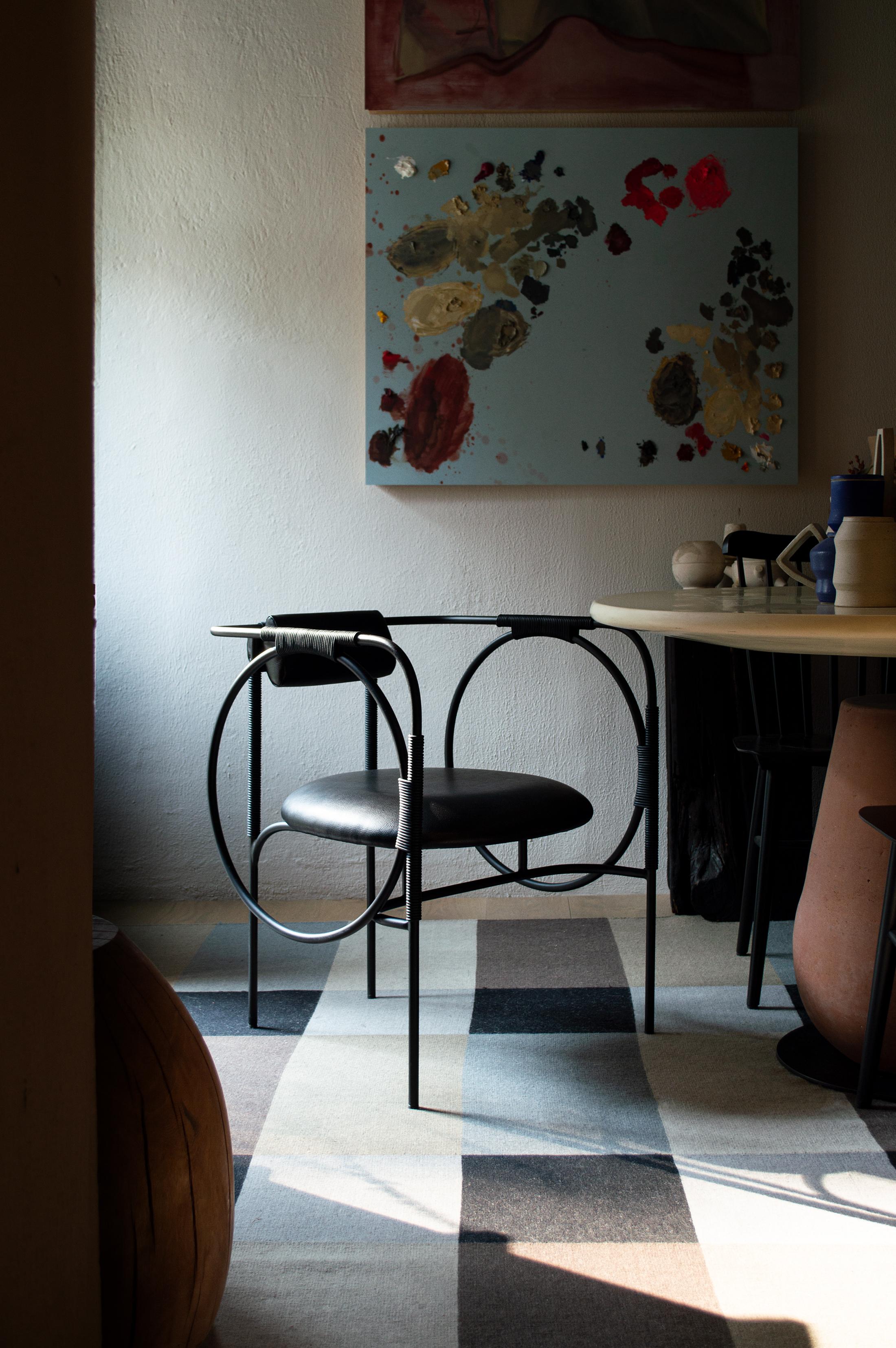Trotter is the first piece in ACOOCOORO's new steel and leather seating series, partially informed by equestrian sports' paraphernalia. The rolled steel structure turns and travels in a seemingly endless loop, supporting the repurposed leather cords