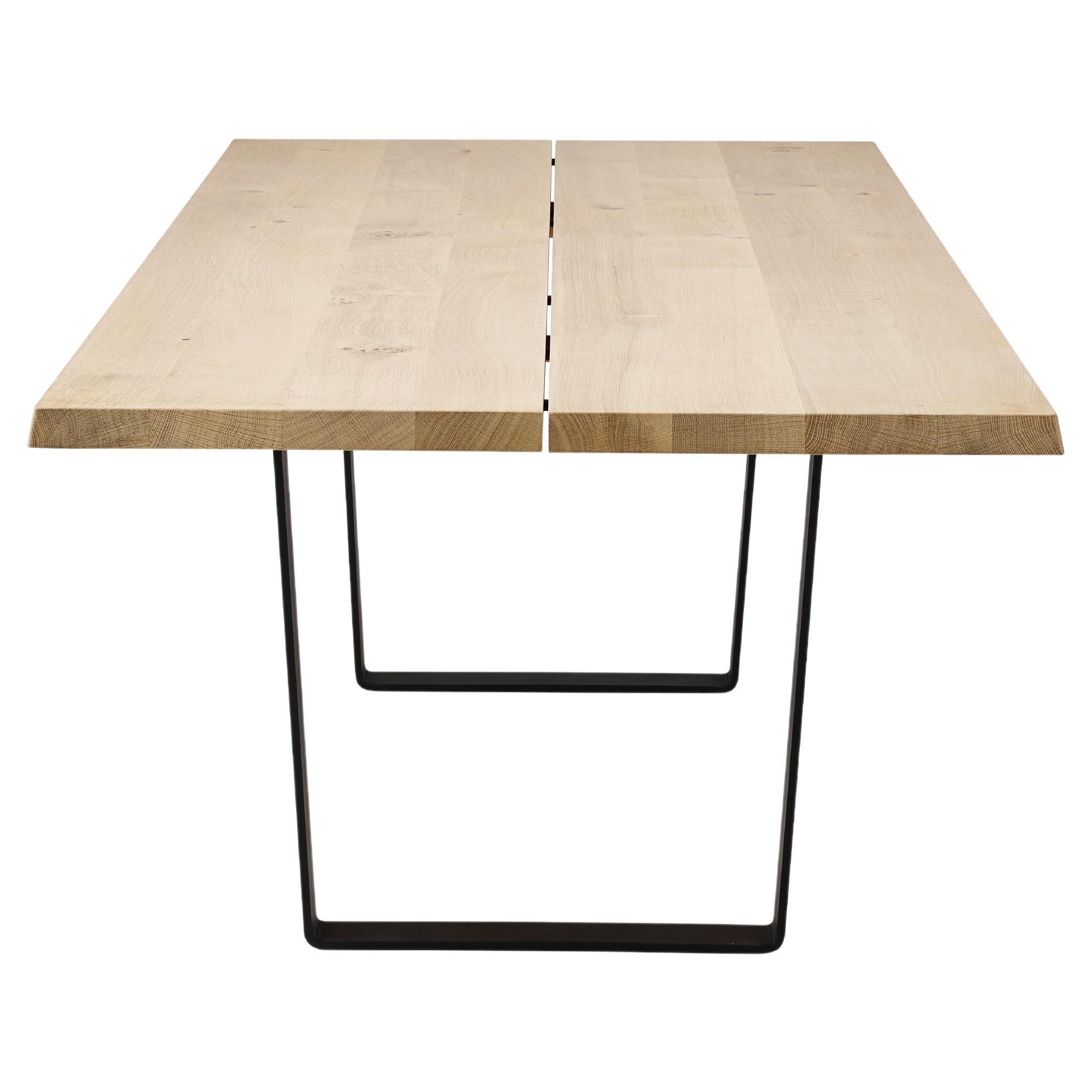 Lowlight dining table, rectangular, 200 cm.

Solid wood tabletop and black powder coated steel legs. 
Handmade in Denmark.

Measure: Height: 72 or 74 cm

Tabletop dimensions:
– 180 x 100 cm
– 200 x 100 cm
– 220 x 100 cm
– 240 x 100 cm
–