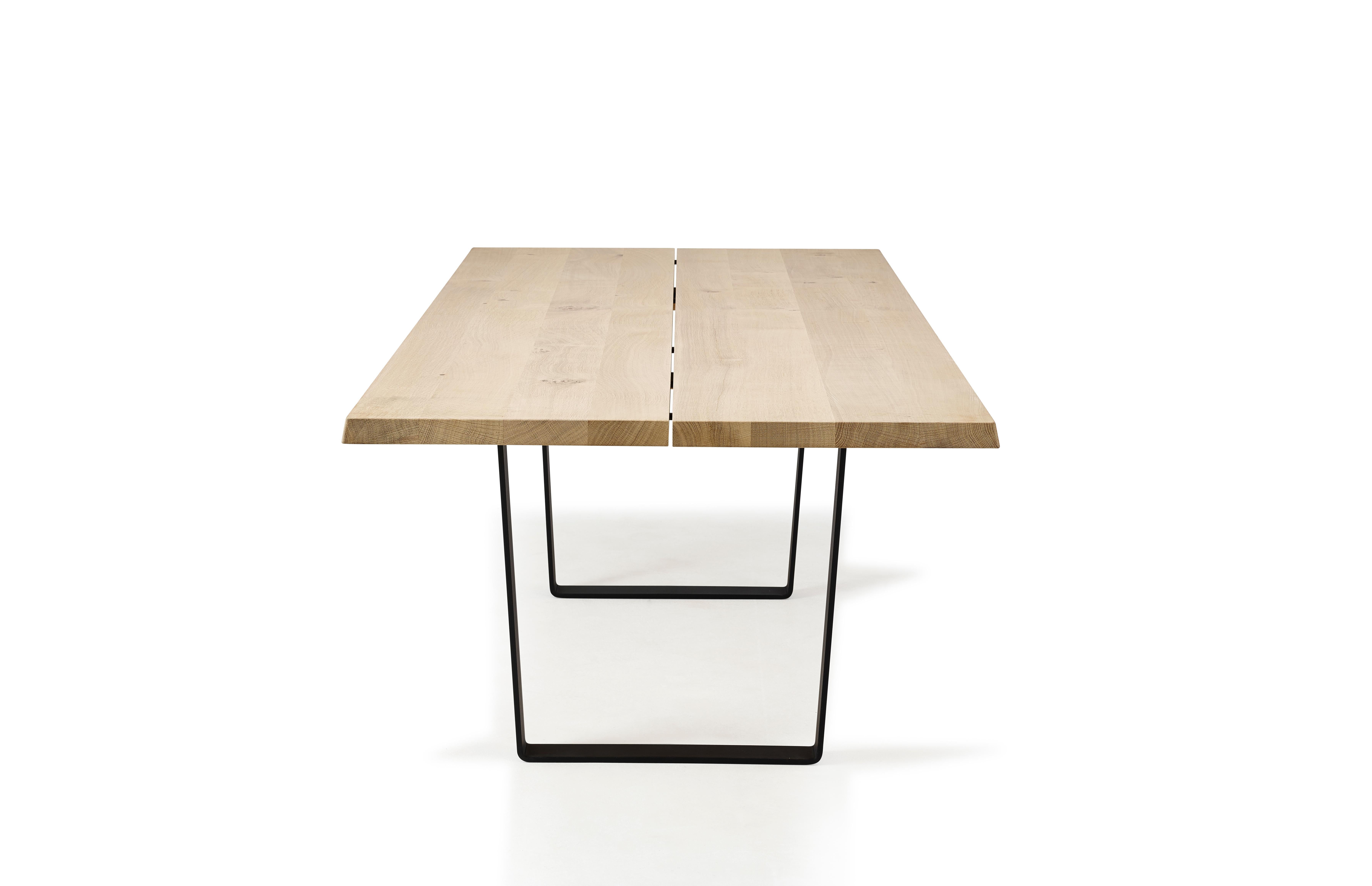 Lowlight Dining table, rectangular, 220 cm

Solid wood tabletop and black powder coated steel legs. 
Handmade in Denmark.

Measure: Height: 72 or 74 cm

Tabletop dimensions:
– 180 x 100 cm
– 200 x 100 cm
– 220 x 100 cm
– 240 x 100 cm
–