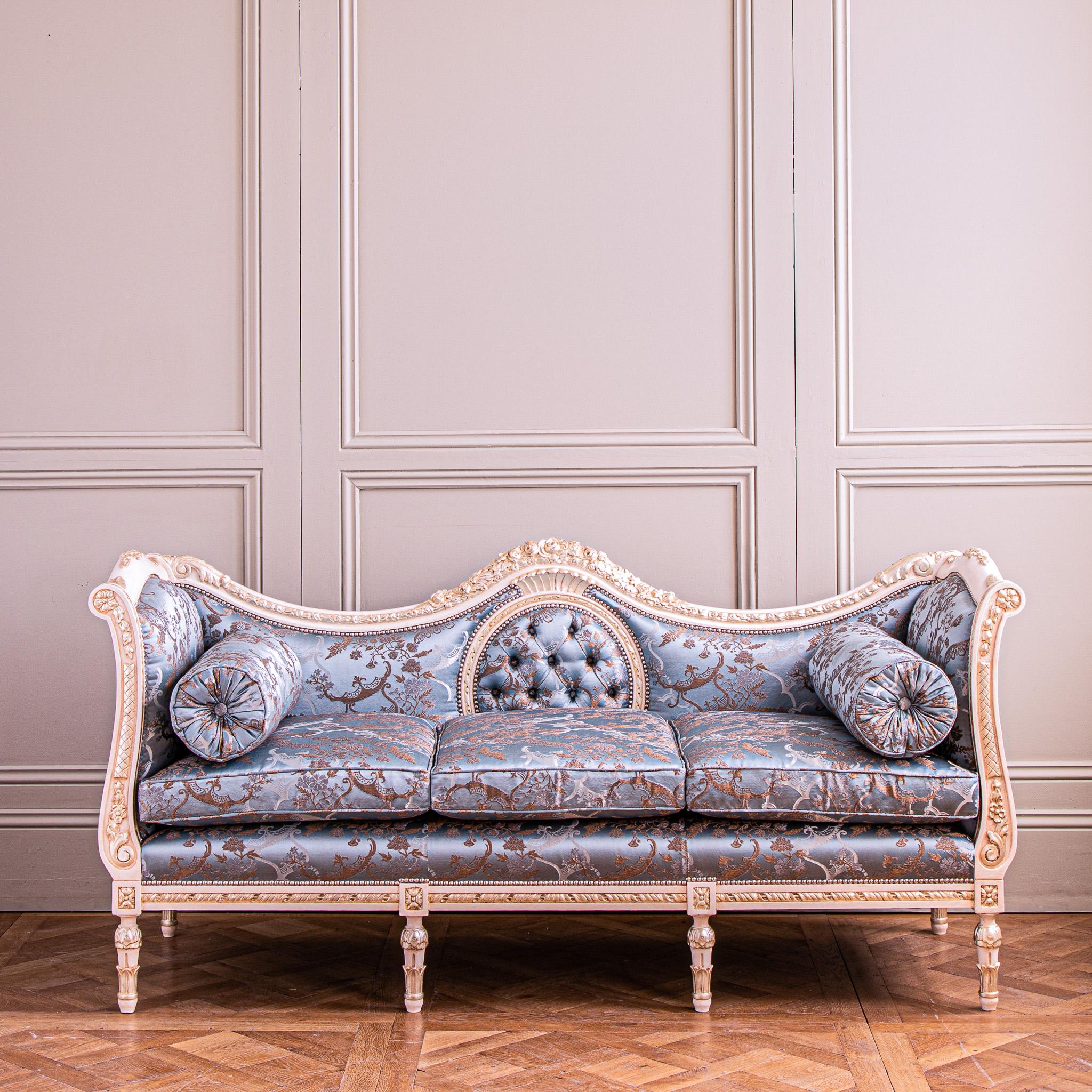 This exceptional, Louis XVI style sofa/settee is hand carved in solid lime wood and can be customized to your requirements.
This French design features finely carved details, including: floral & ribbon work with stylised acanthus leaf adorned legs.