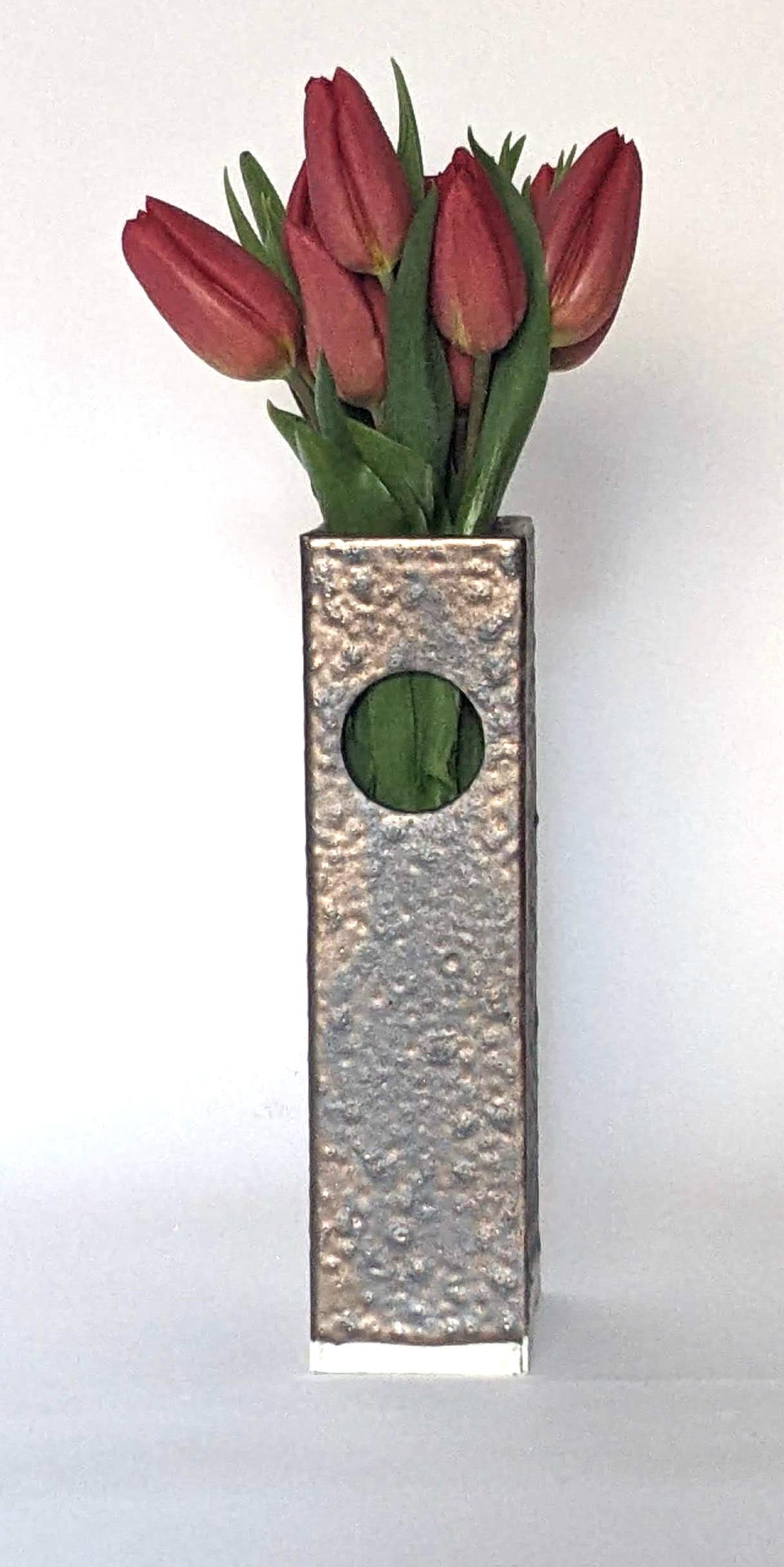 This meticulously crafted glazed ceramic vase design features a sleek modern rectangle hollow brick form with circular and triangular openings. This unique piece stands out for its exquisite hand-crafted construction, thoughtful design, and