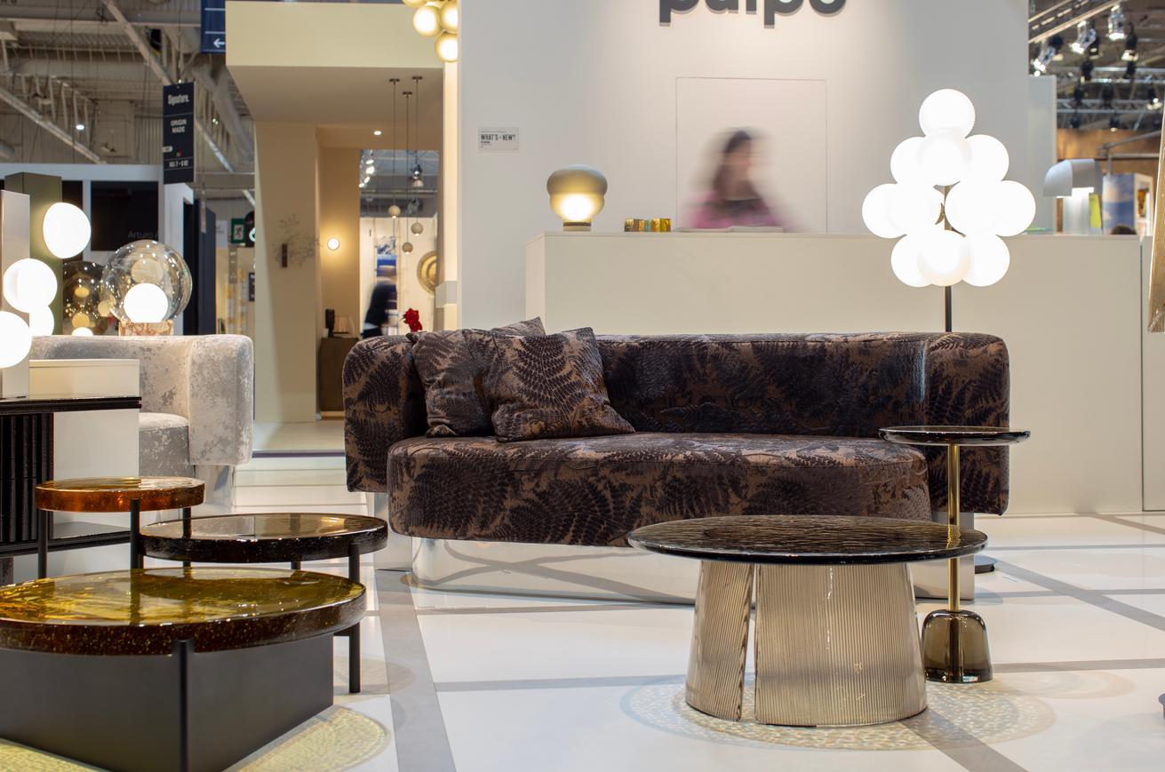 The bubbled surface of the cast glass table top dances against with the smooth lines of the fluted cast glass base. The bent side table expresses the beauty of glass in all its forms. With a striking simplicity, this interior companion has the