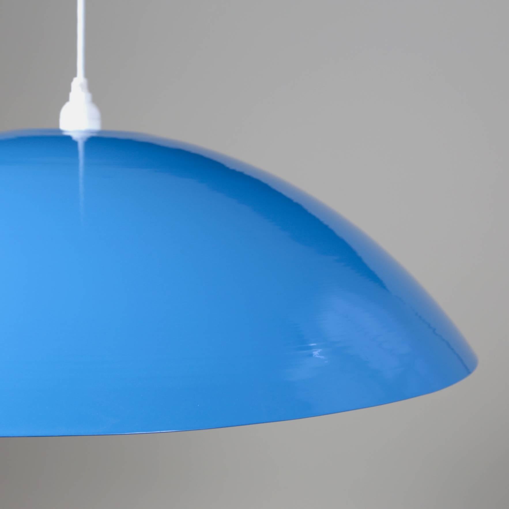 This listing is for a custom light fixture that Souda completed for a startup-company's office in NYC. Shown in this image shows the pendant with a light blue finish. It was a leftover from this custom project and was used in Souda's office so it