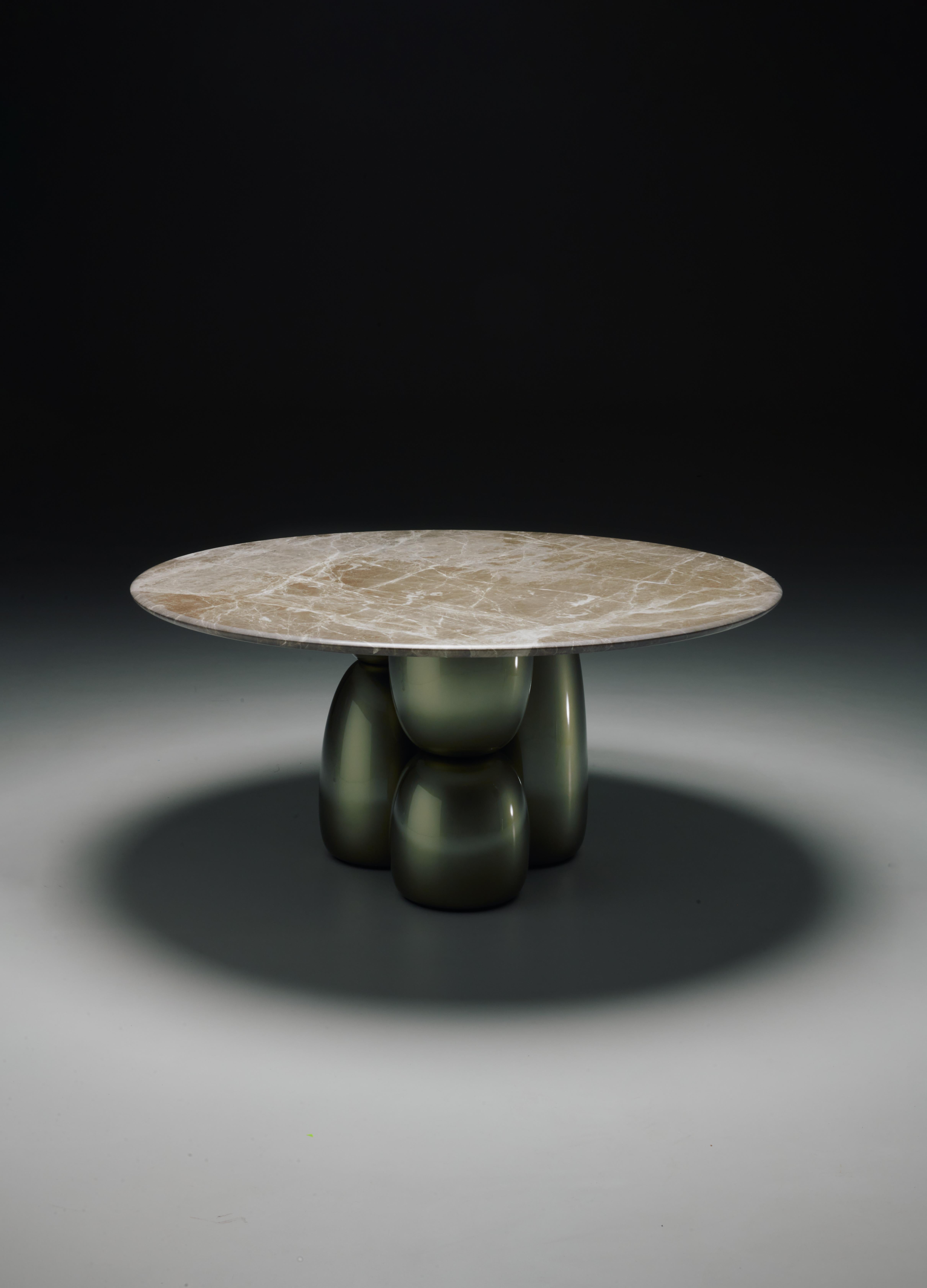 Gem Table - Top in glass smoke
Liquid painted
Design by Sebastian Herkner
The Gem table boasts an interactive design. Its configuration is reminiscent of the stacked towers made of round pebbles on beaches. It is playful and mystical. The table
