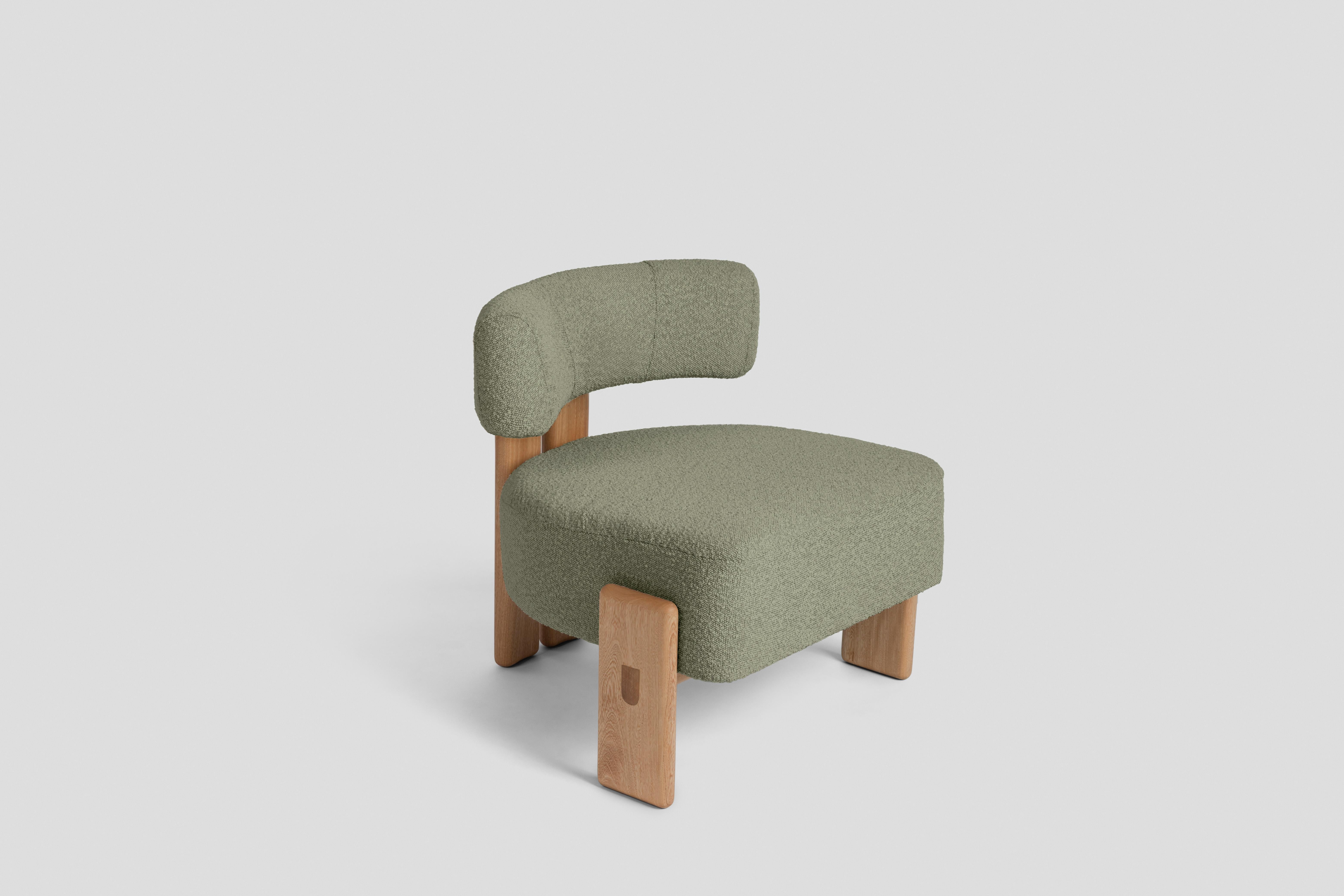 Inspired by three-legged chairs, this low chair has a back leg formed by two pieces joined by a circular wooden detail and two side legs that embrace the seat. It is intended to be a complement in a living room or an accent chair for a bedroom. It