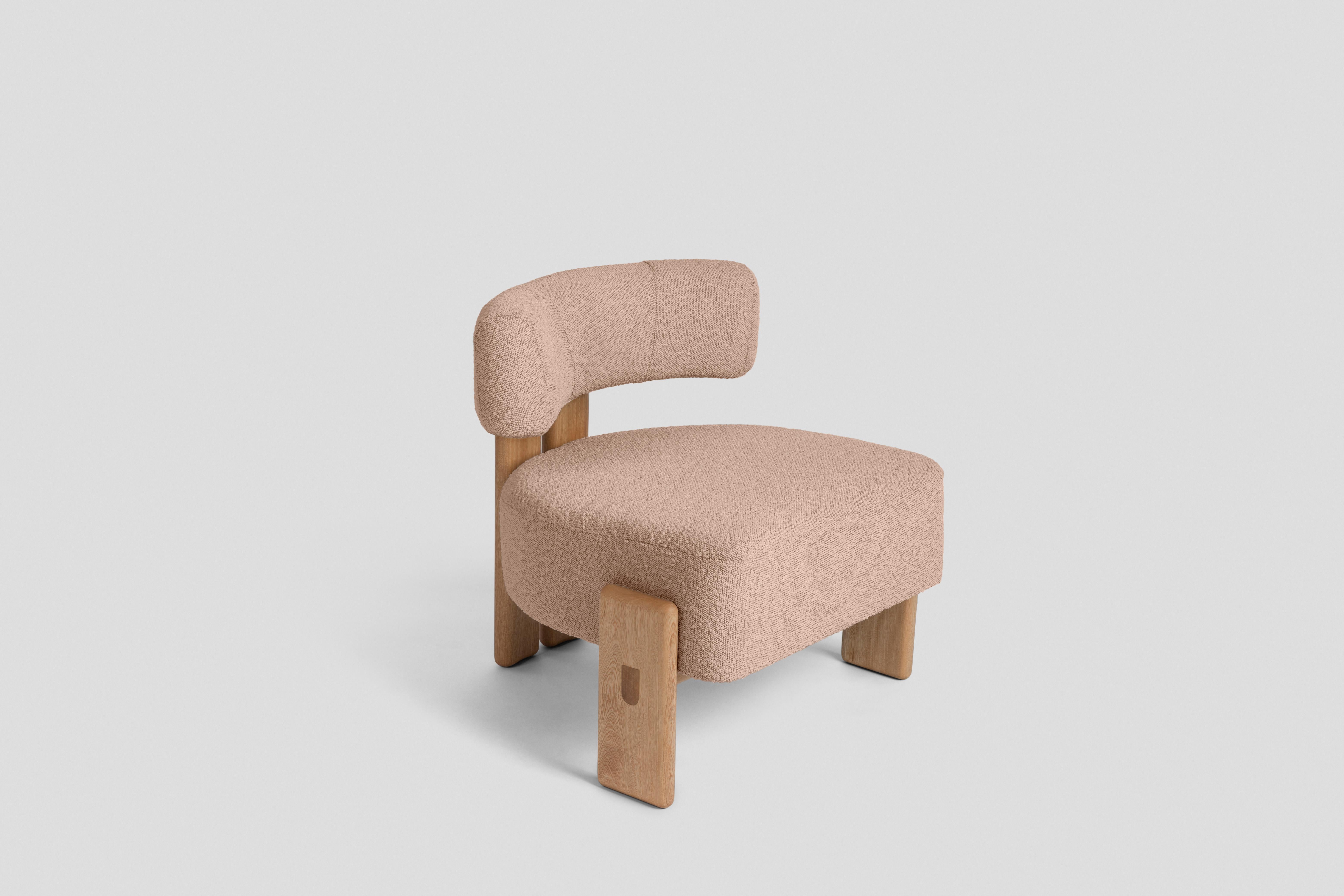 Inspired by three-legged chairs, this low chair has a back leg formed by two pieces joined by a circular wooden detail and two side legs that embrace the seat. It is intended to be a complement in a living room or an accent chair for a bedroom. It