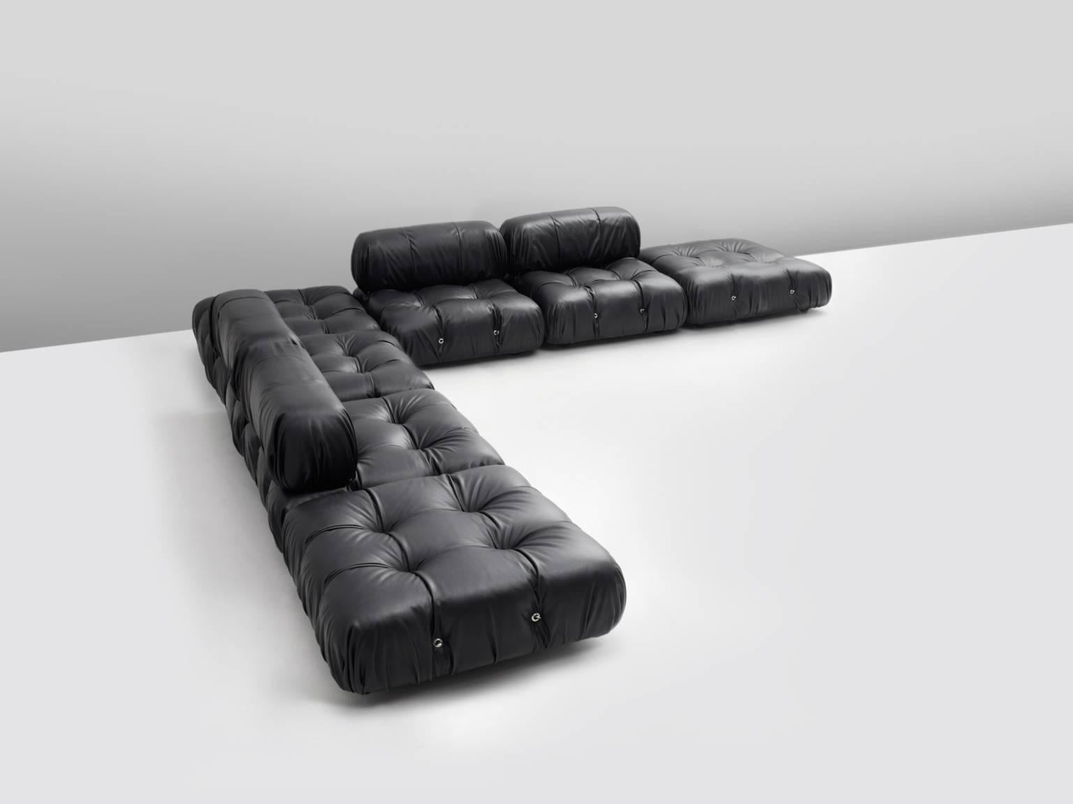Mario Bellini, 'Camaleonda' sofa, black leather, Italy, 1972. 

The seven sectional elements of this can be used freely and apart from one another. The picture that is displayed can therefore be customized to your own wishes. The backs and