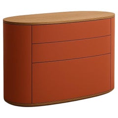 Customizable Minimalist Oval Chest of Drawers In Solid Oak & Orange Lacquer