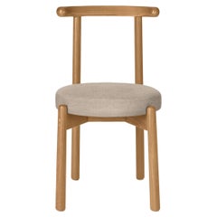 Sedia da pranzo moderna Colima personalizzabile, legno massiccio e imbottitura Latte.