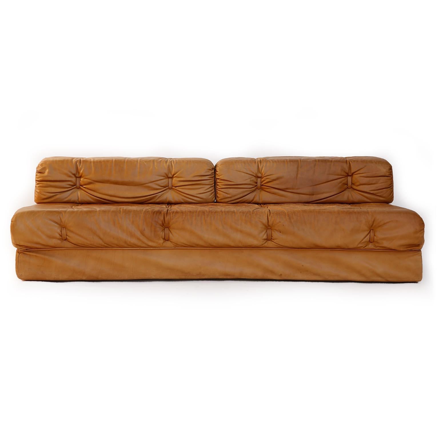 A modular sofa in aged and patinated leather designed by Karl Wittmann and manufactured by Wittmann Möbelwerkstätten, Austria, in midcentury in 1970s.
The set consists of three sectional elements which were made to be used freely and apart from one