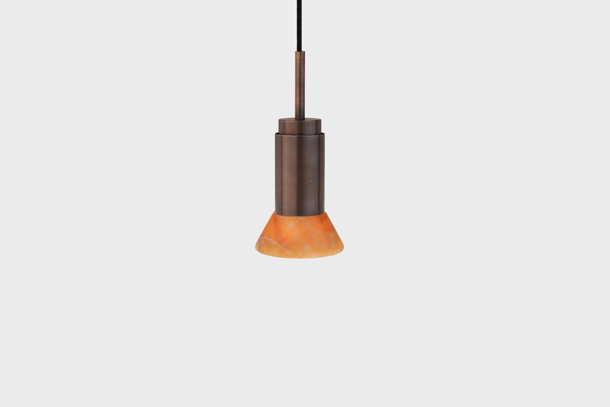Customizable Pendant Lamp 'Donya Spot' by Anour, Amber Trapeze, Browned Brass

Dimensions:
ø 12 cm x H. 25 cm

Technical details:
- 240V / 120V
- GU 10 bulb (bulb not included)
- Wattage: Max. 6 W

Cord: 
- 3,2m black textile cord 

Dimmer: 
- No