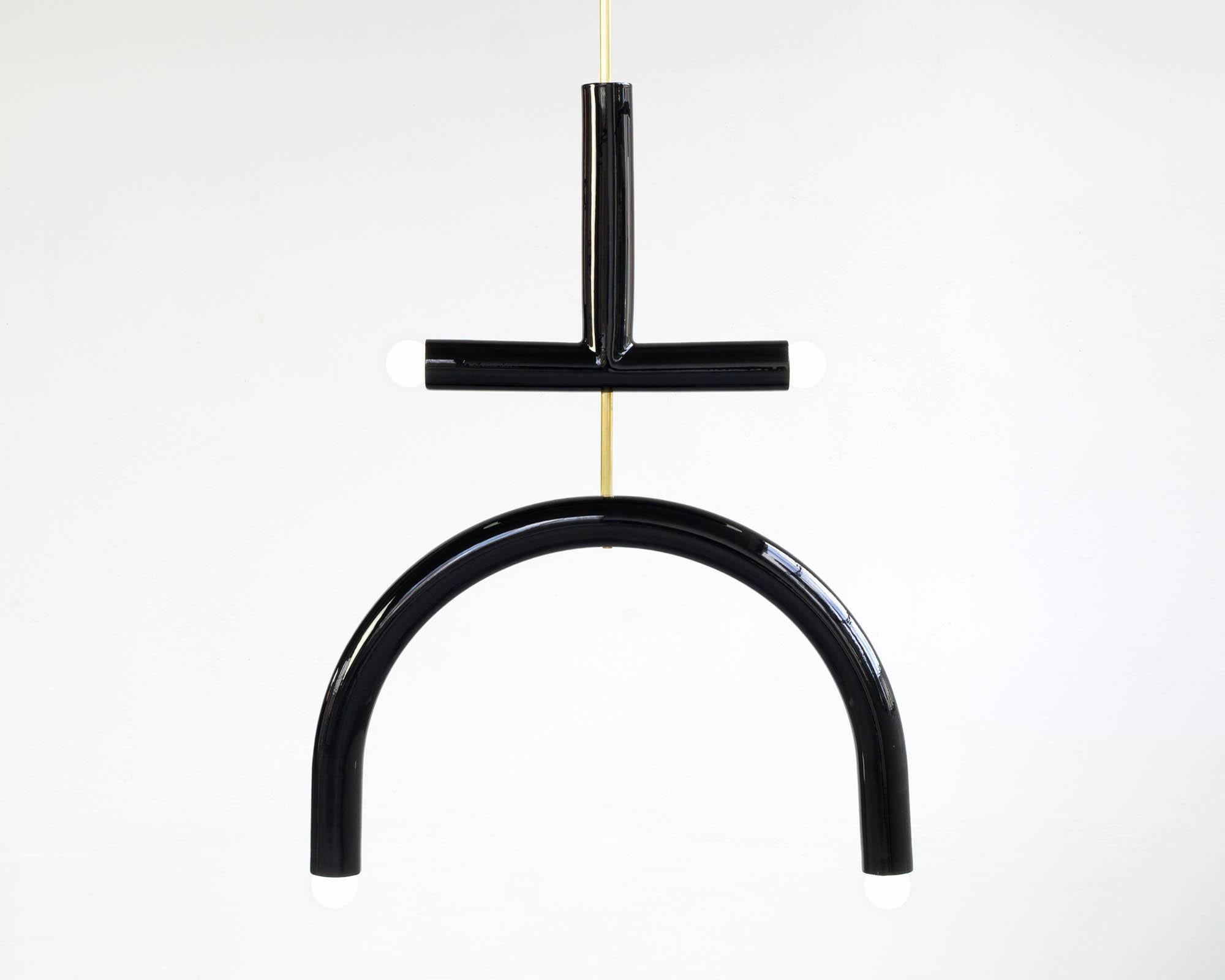 TRN E2 Pendant lamp / ceiling lamp / Chandelier 
Designer: Pani Jurek

Dimensions: H. 77.5 x 55 x 5 cm
Model show: Black 

Bulb (not included): E27/E26, compatible with US electric system

Materials: Hand glazed ceramic and brass
Rod: brass, length