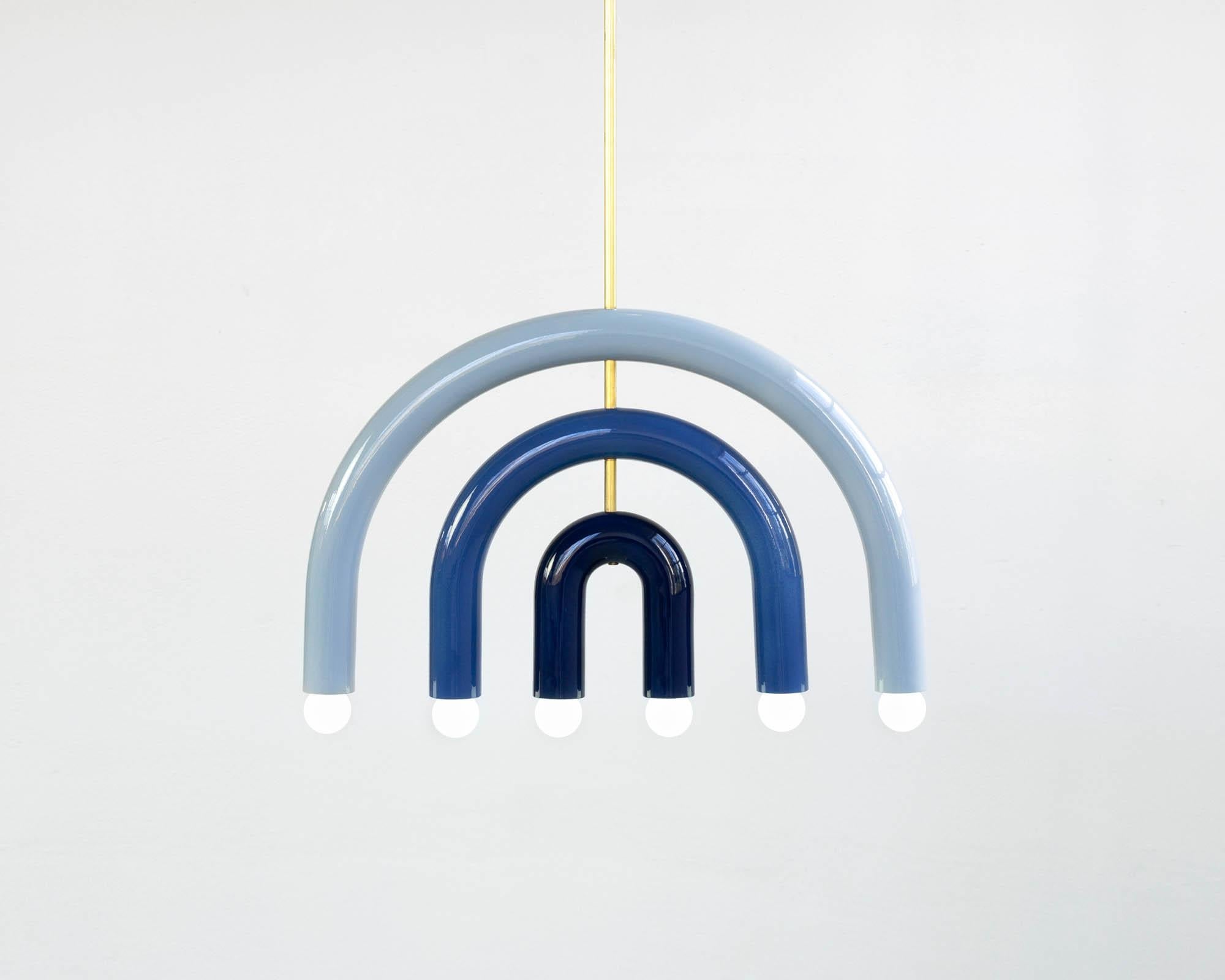 TRN F1 Pendant lamp / ceiling lamp / chandelier
Signed by Pani Jurek

Dimensions: H. 375 x 55 x 5 cm
Model shown: Light blue, medium blue & navy blue 

Bulb (not included): E27/E26, compatible with US electric system

Materials: Hand-glazed ceramic