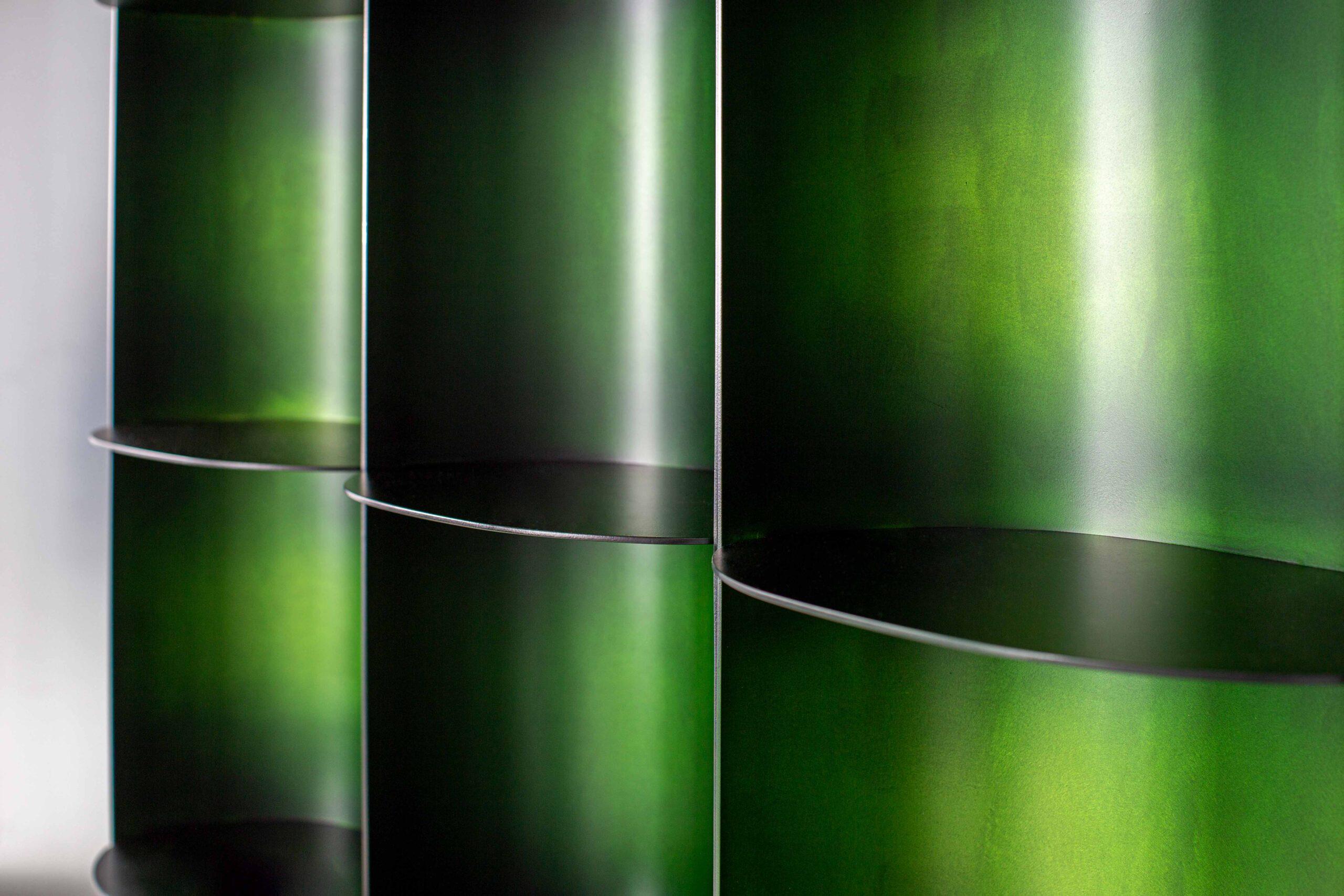 Sebastian Herkner’s work of full aluminum seems to hover over the ground. Invisibly attached to the wall, every fixation of the variably installable ensemble is invisible. All three of the optional colors render its physical appearance in a plain,