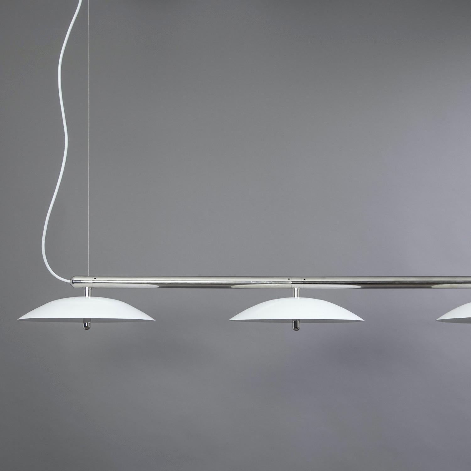 Price is for a signal linear pendant with white shade and nickel accents. This piece is customizable so we can also make the finishes per order to your spec. 

Lamping: G8 LED Bulbs (included)
Canopy: Black, 5in Diameter, .25in height
6x G8 LED