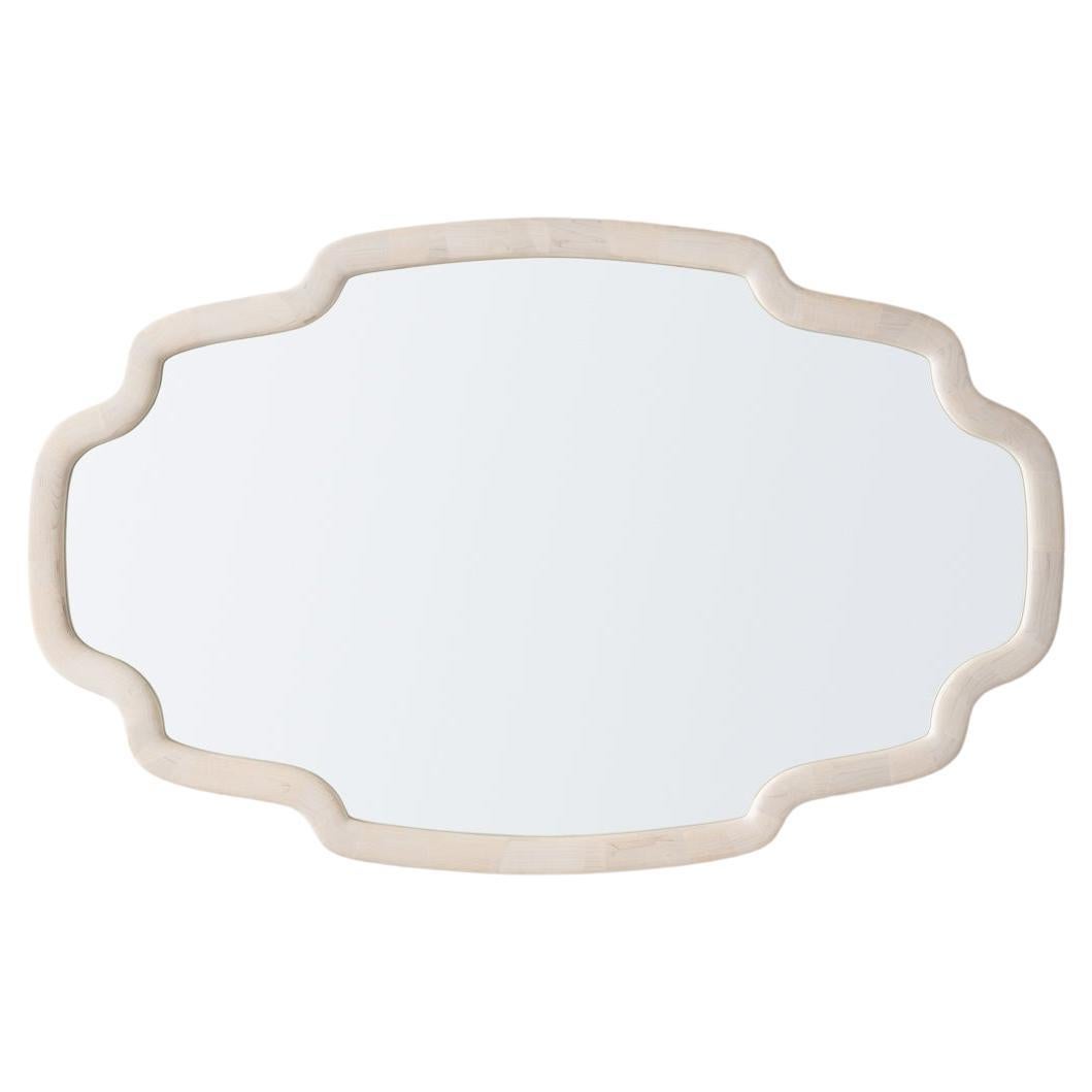 Espejo personalizable apilado de inspiración Deco, mostrado en Arce con acabado Marfil