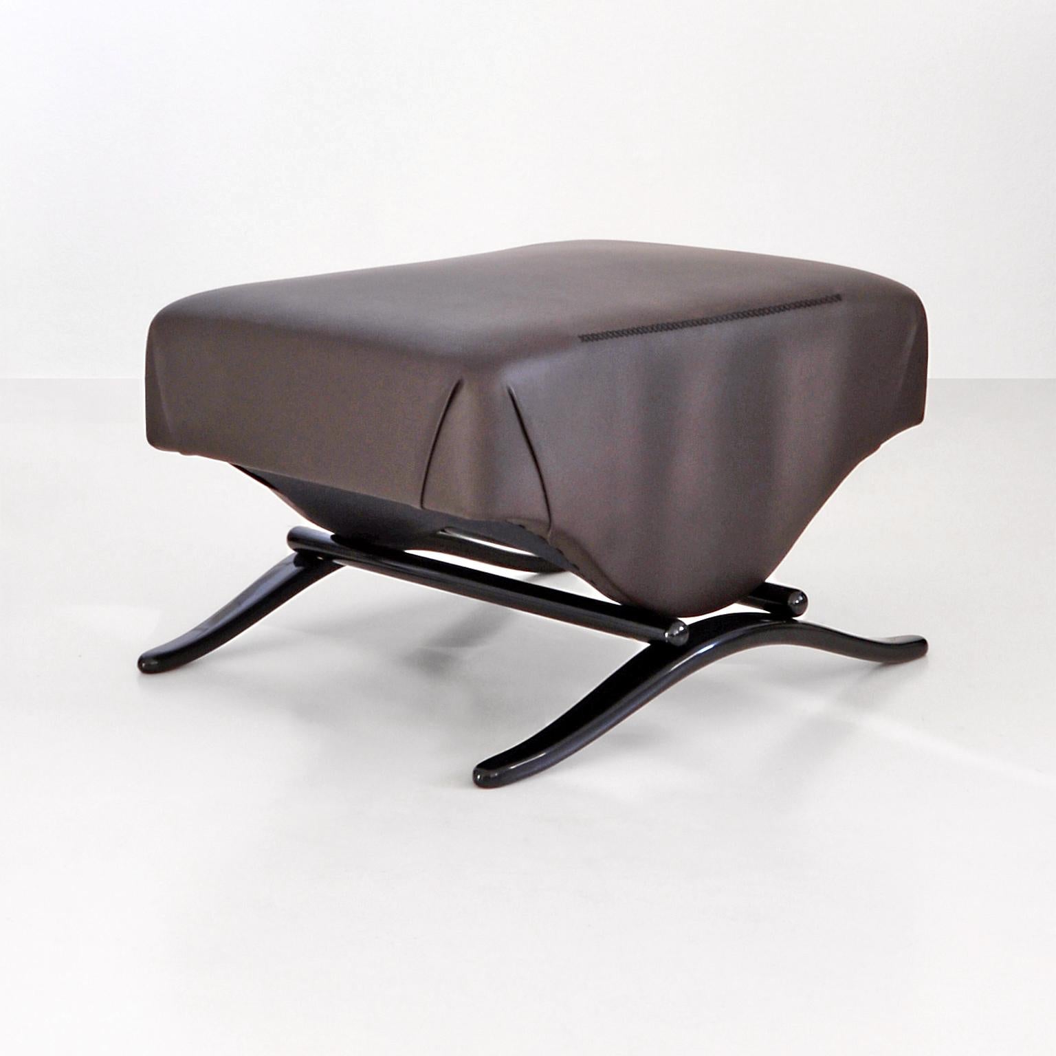 Customizable modernist stool, bet wood, leather upholstery, glossy lacquer.

Individual selection of fabric covers, wood lacquering in various colours and finish available on request in different amounts. Delivery time: 10-12 weeks