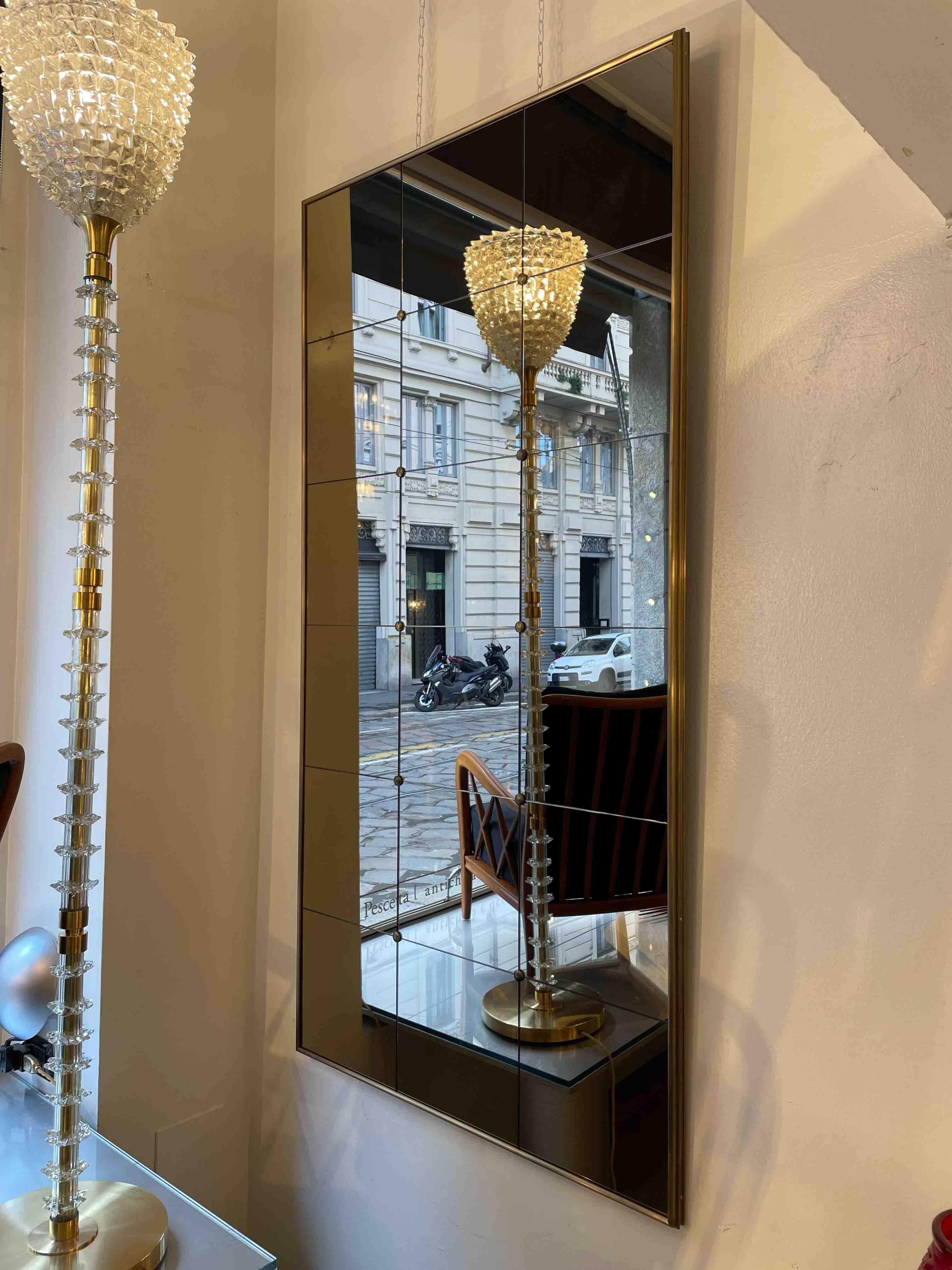 In this card, rectangular mirror measuring 90 x 180h cm, brass double frame, bronzed mirror and squares with diamond studs. 

Pescetta presents the Collection of Brass Mirrors, made to measure and fully customisable.

Designed both for sumptuous