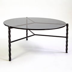 Mesa baja de hierro Von de Souda, negra y de cristal, modelo de pie