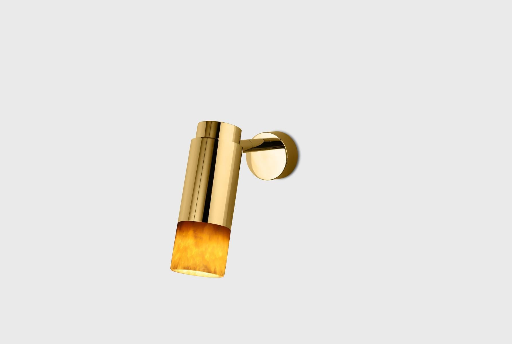 Customizable Wall Lamp 'Donya Pivot' by Anour, Amber Cylinder Onyx, Polished Brass

Dimensions:
H: 17,5 cm x 17 cm x Ø 6 cm

Technical details:
- Voltage: 240V / 120V
- GU 10 bulb (bulb not included)
- Wattage: Max. 6 W

Dimmer: 
- No