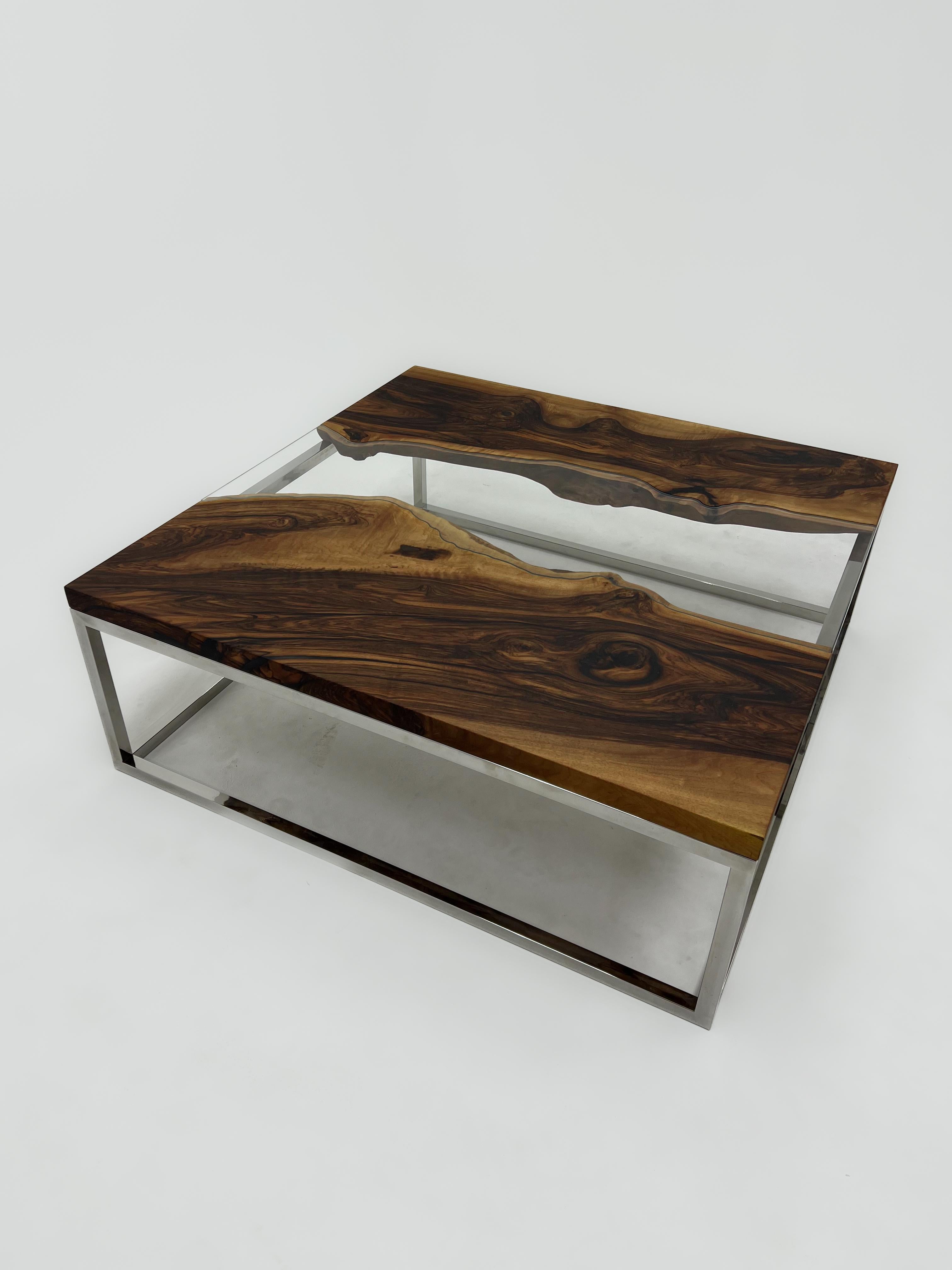 Walnut Glass River Coffee Table

This coffee table is made walnut wood. The glass is cut according to the curves of the wood and brought together in a unique combination.

Custom sizes, colours and finishes are available!