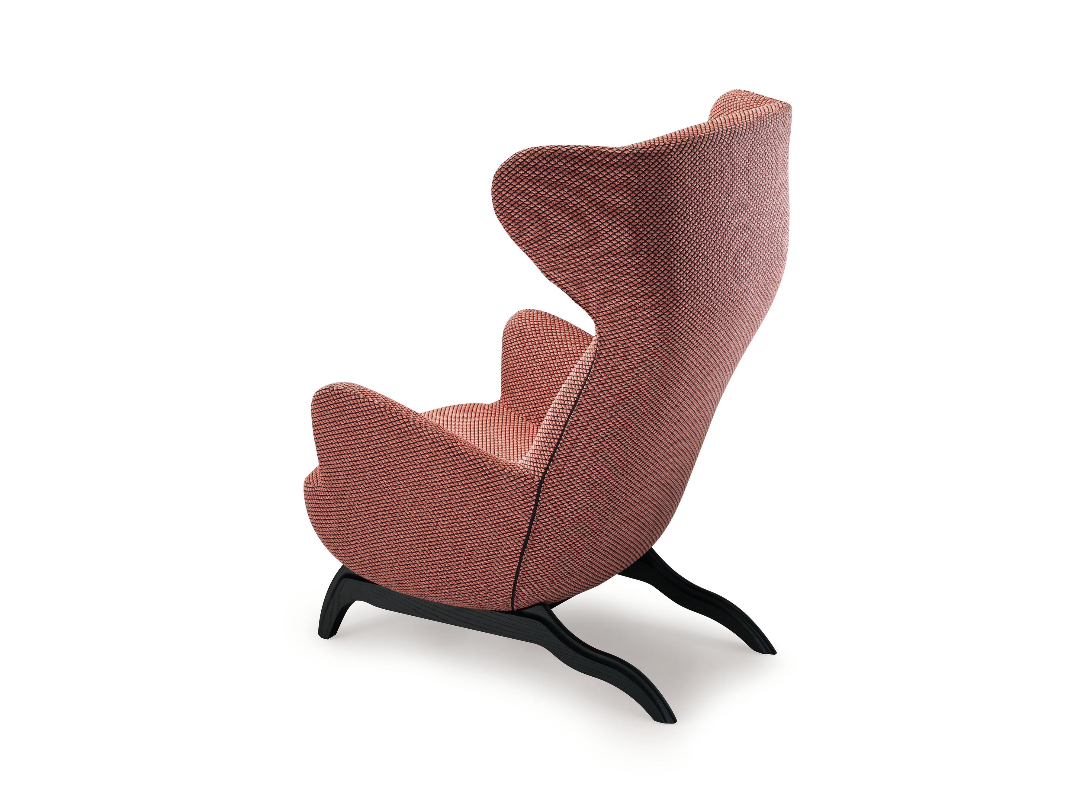 Armchair/ Bergére. Base in solid natural or black varnished oak, or in solid natural Canaletto walnut; wax-finished varnish. Steel frame, with elastic strips suspension. Upholstery in self-extinguishing polyurethane foam/heat-bound polyester fibre.