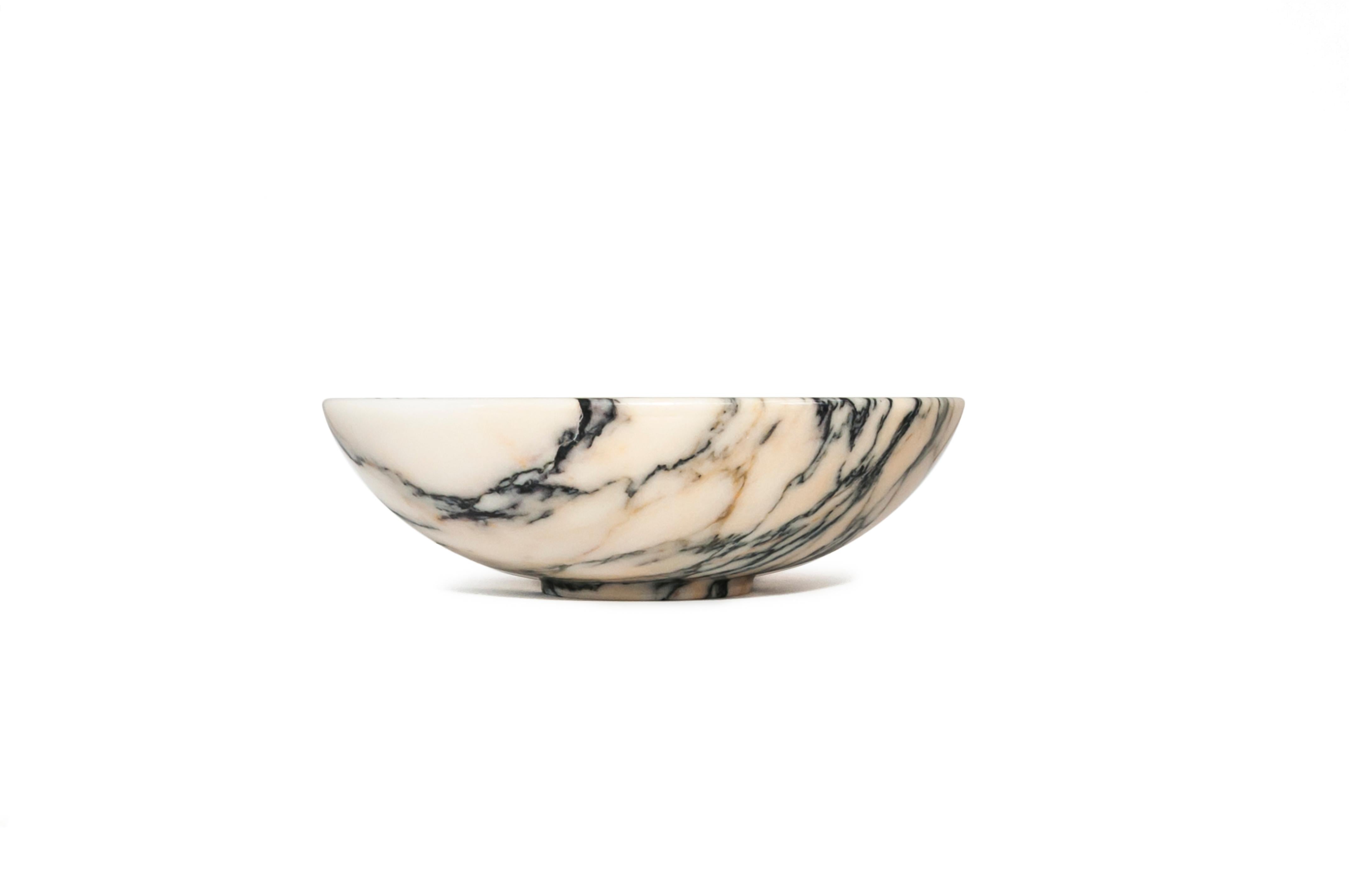 Customized bowl in Paonazzo marble honed height 11cm, 30cm diameter D 9cm, extracted and processed in Carrara, Italy. You have a 100% made in Italy product.
It is ideal for fruit and to present food.
Each piece is in a way unique (every marble