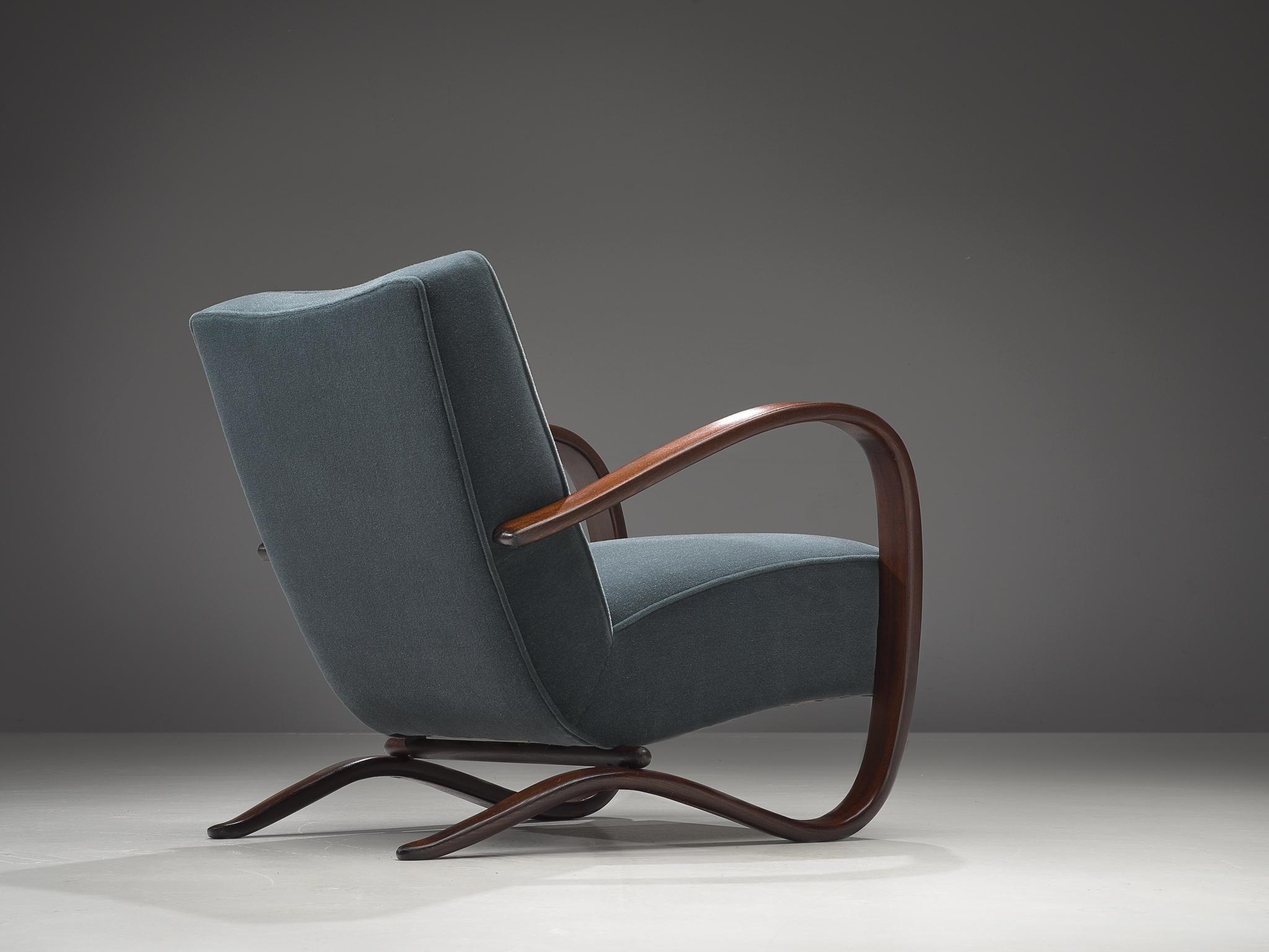 Jindrich Halabala, lounge chair, mohair fabric and ebonized wood, Czech-Republic, 1930s 

This Halabala chair is part of our customized midcentury design collection. The easy chairs is upholstered by the experienced craftsmen in our own upholstery