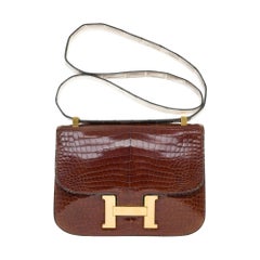 Customized Hermès Constance shoulder bag in brown croco with strap in Himalaya