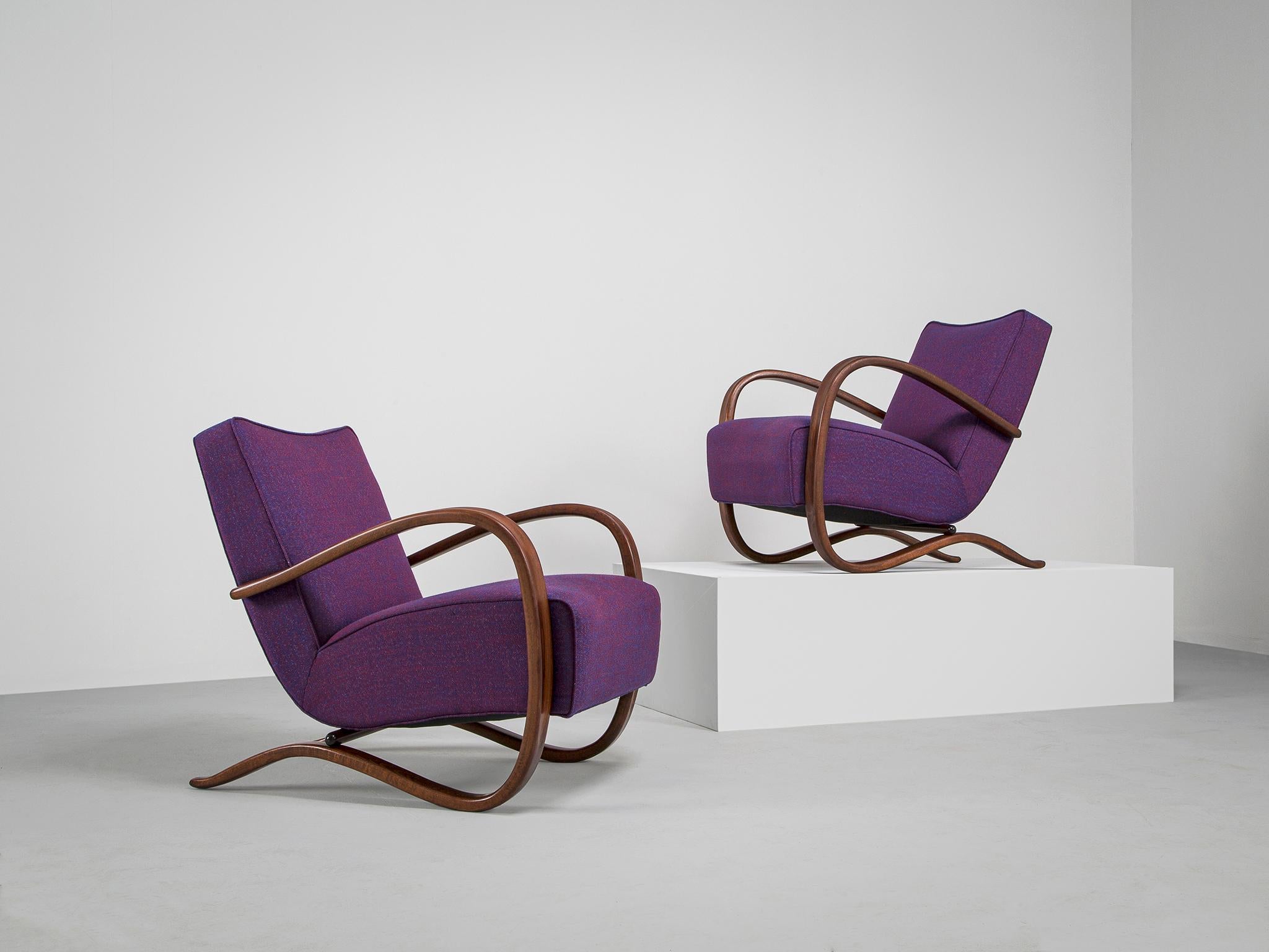 Jindrich Halabala, lounge chairs, purple kvadrat sunniva 0762 fabric and stained beech, Czech Republic, 1930s. 

These extraordinary pair of Halabala chairs are recently upholstered with a purple Kvadrat sunniva upholstery which is done in our own