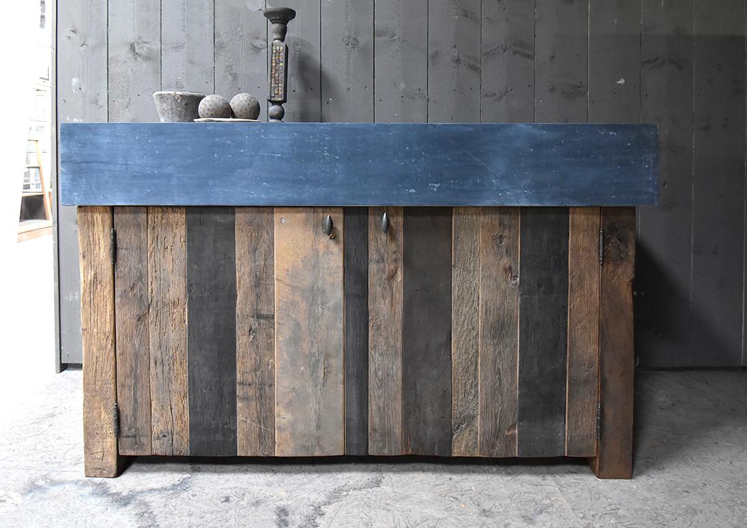 This kitchen block we made out of an bluestone sink and
old oak floor boards. It is in his whole.