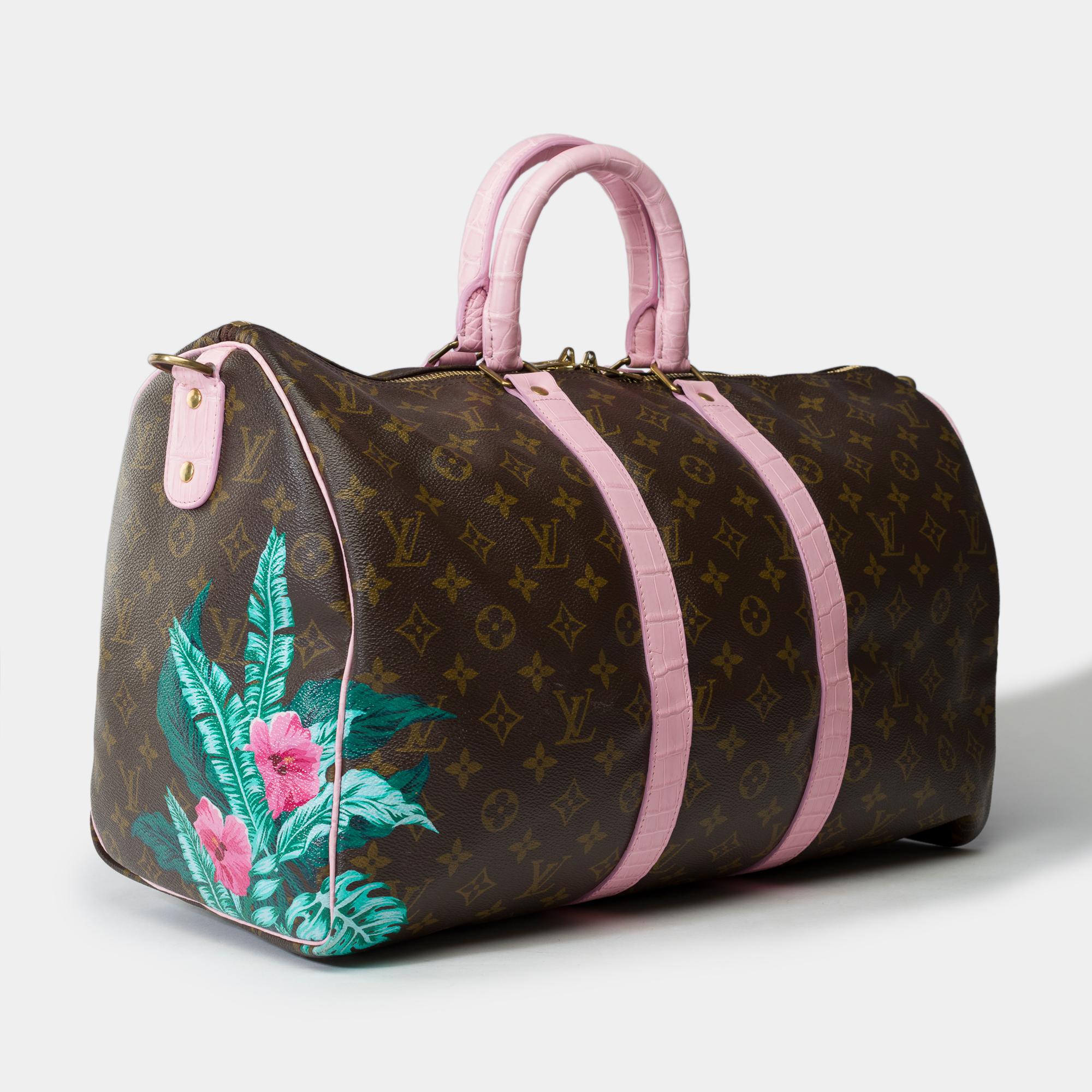 Exceptional​ ​and​ ​Unique​ ​Louis​ ​Vuitton​ ​Keepall​ ​45​ ​Travel​ ​Bag​ ​in​ ​Brown​ ​Monogram​ ​Coated​ ​Canvas​ ​Customized​ ​with​ ​Genuine​ ​Pink​ ​Crocodile​ ​Porosus​ ​Leather​ ​at​ ​Handles​ ​and​ ​on​ ​Belly​ ​Bands

Gilt​ ​metal​
