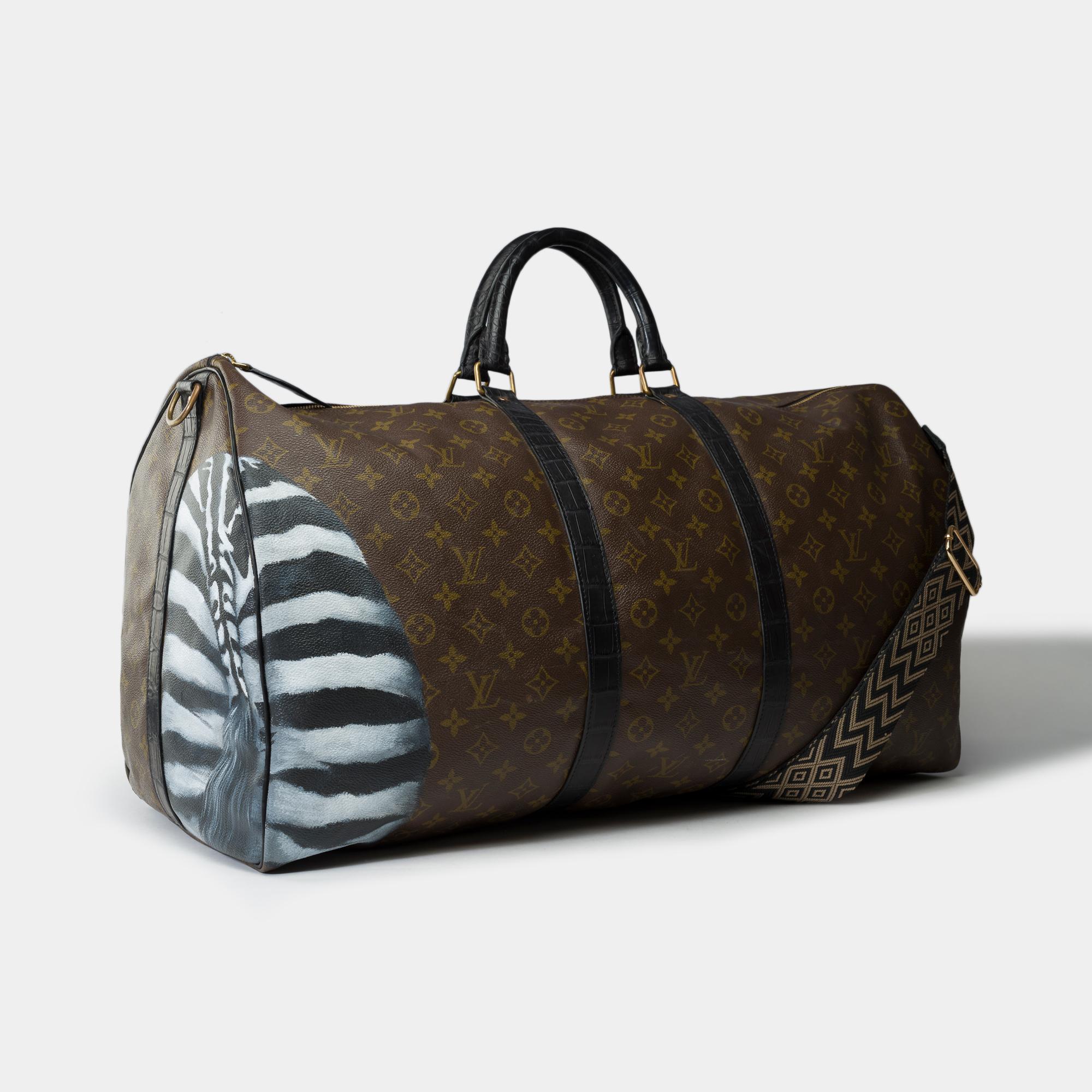 Exceptional​ ​and​ ​Unique​ ​Louis​ ​Vuitton​ ​Keepall​ ​60​ ​Macassar​ ​in​ ​brown​ ​monogram​ ​coated​ ​canvas​ ​zebra-patterned​ ​customized​ ​with​ ​genuine​ ​black​ ​Crocodile​ ​Porosus​ ​leather,​ ​black​ ​crococdile​ ​to​ ​the​ ​handles​ ​on​