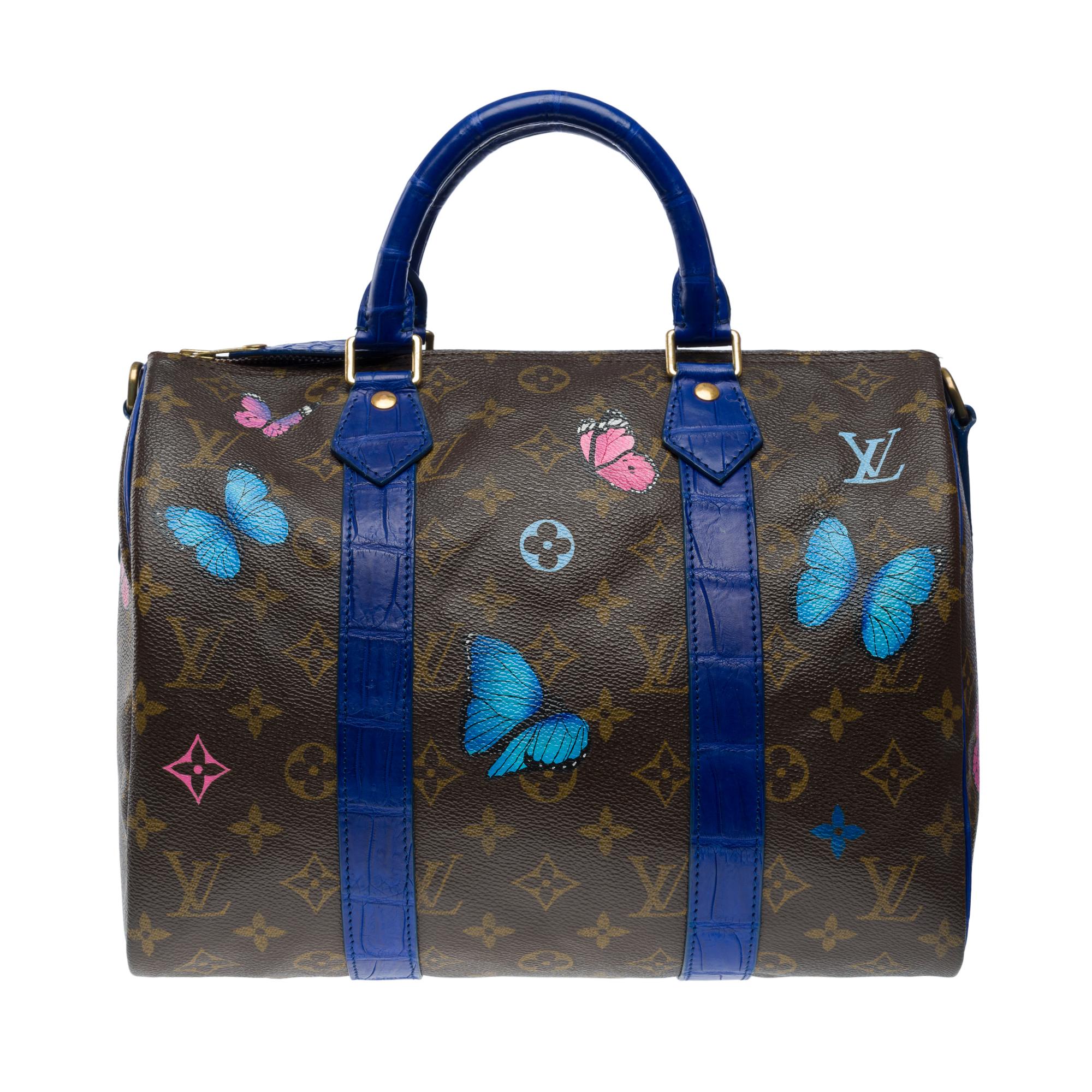 Exceptional​ ​and​ ​Unique​ ​Louis​ ​Vuitton​ ​Speedy​ ​30​ ​handbag​ ​in​ ​brown​ ​monogram​ ​coated​ ​canvas​ ​customized​ ​with​ ​butterfly​ ​patterns​ ​and​ ​genuine​ ​blue​ ​Porosus​ ​crocodile​ ​leather​ ​with​ ​handles​ ​and​ ​on​ ​the​