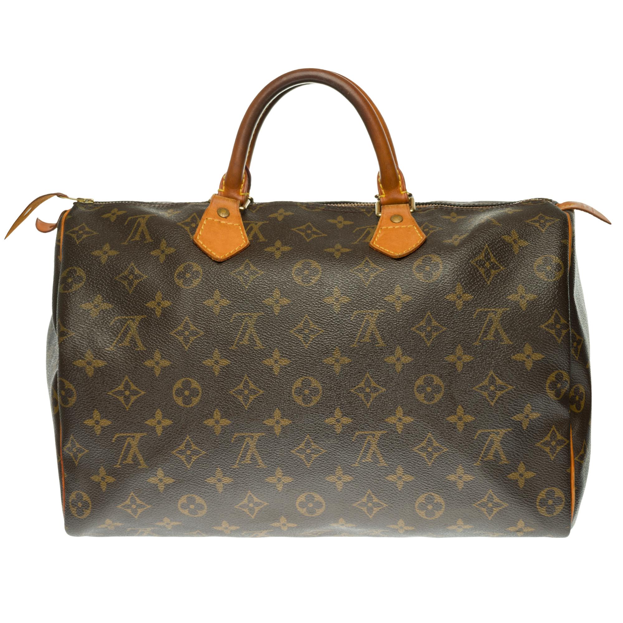 Louis Vuitton Speedy 35 handbag in customized Monogram canvas 
Gold-tone metal hardware, double leather handle for a carry. Double zip closure.
Interior in brown canvas.
Signature: 