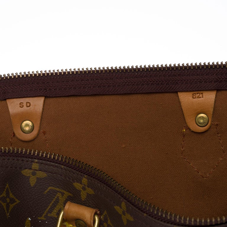 Customized Louis Vuitton Speedy 40 handbag in Monogram canvas 