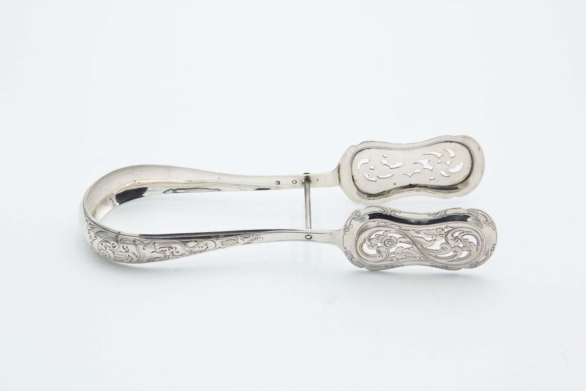 Cut and embossed silver tongs for bread or salads For Sale