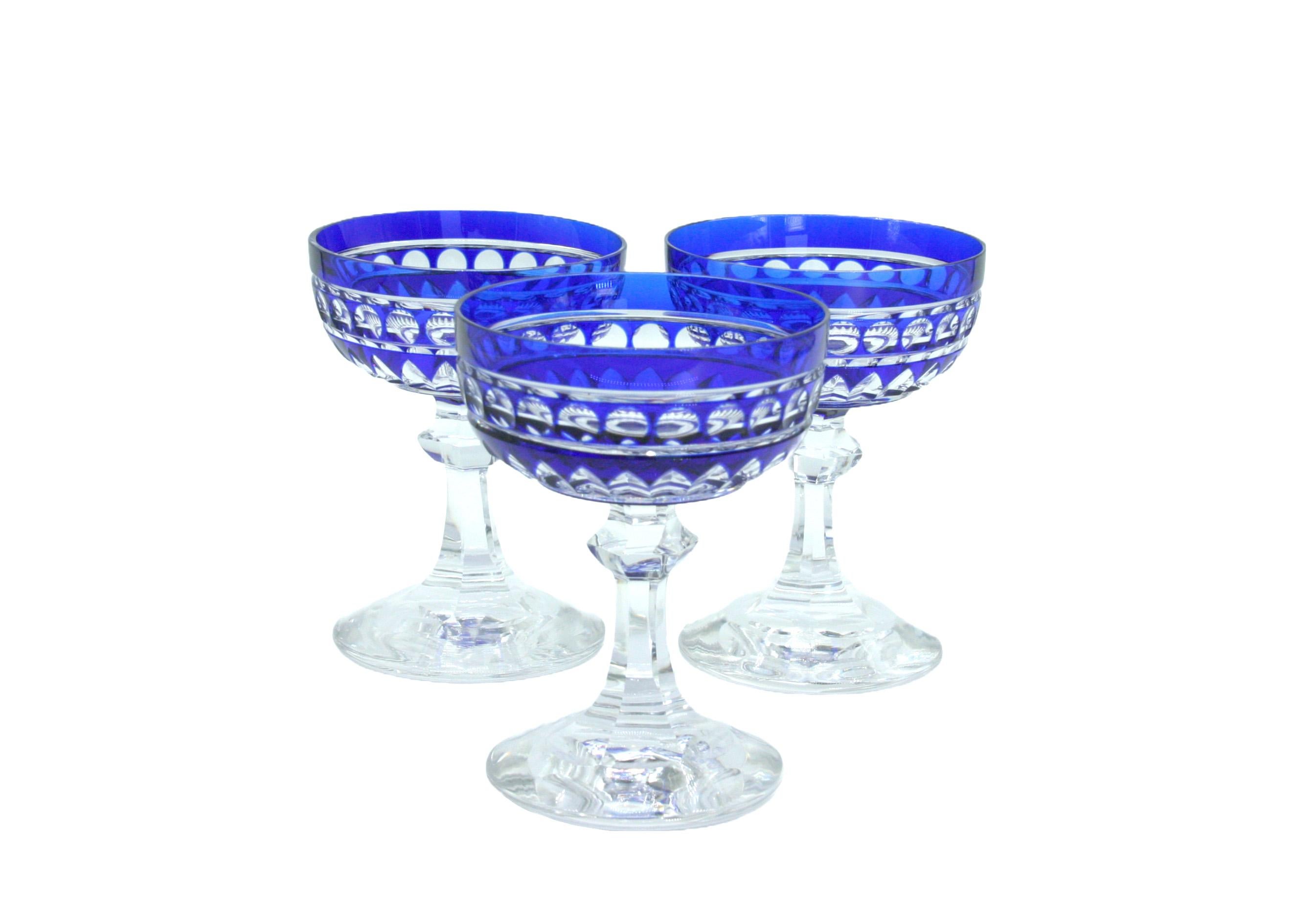 Exquisite set of Val Saint Lambert barware / tableware cobalt blue crystal coupe service for 9 people . Val crystal is regarded as some of the most magnificent ever made and renowned for their exquisite color. This exquisite cut to clear crystal