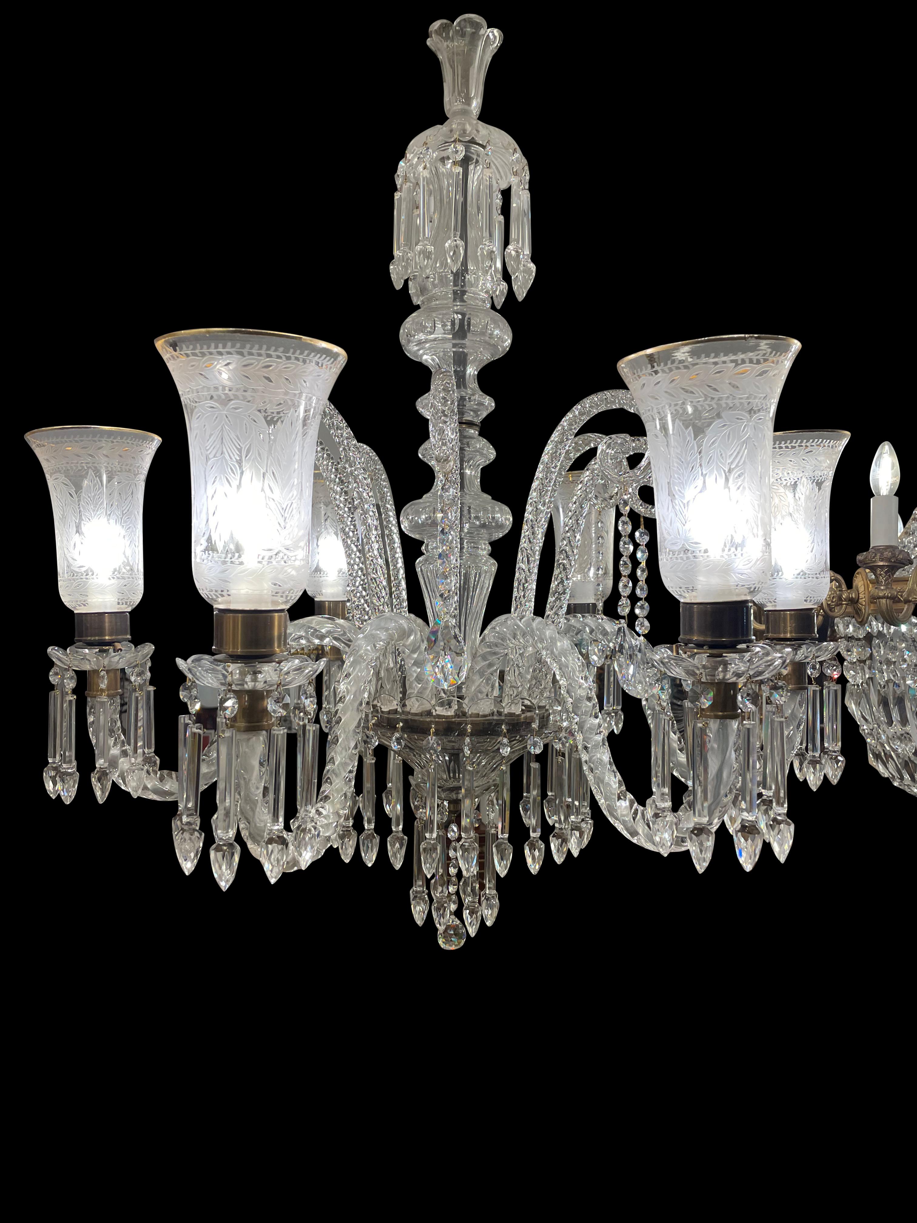 A fine cut crystal chandelier with engraved hurricane shades, 20th century. 

A 20th century cut crystal chandelier of the highest quality, likely made by the firm of either Osler of Birmingham, Blades or Waterford. Every piece of this chandelier