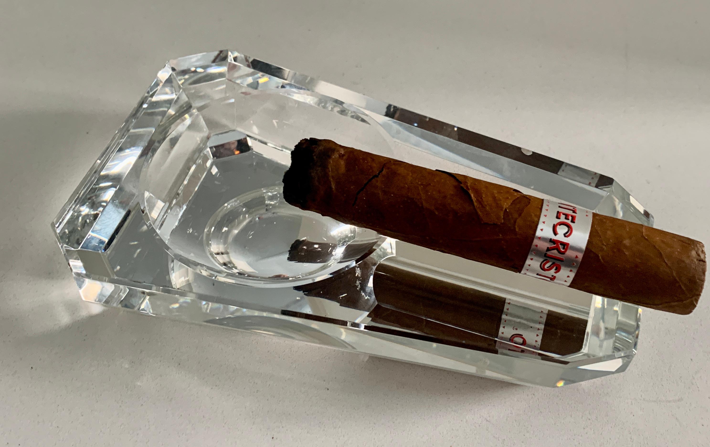 A wonderful cigar ashtray of Cut Crystal - a stunning piece with the truest quality of crystal - a very faceted piece. A compliment any bar, desk or work station, or wine area of your home or office... great for 420 as well. A sleek and very